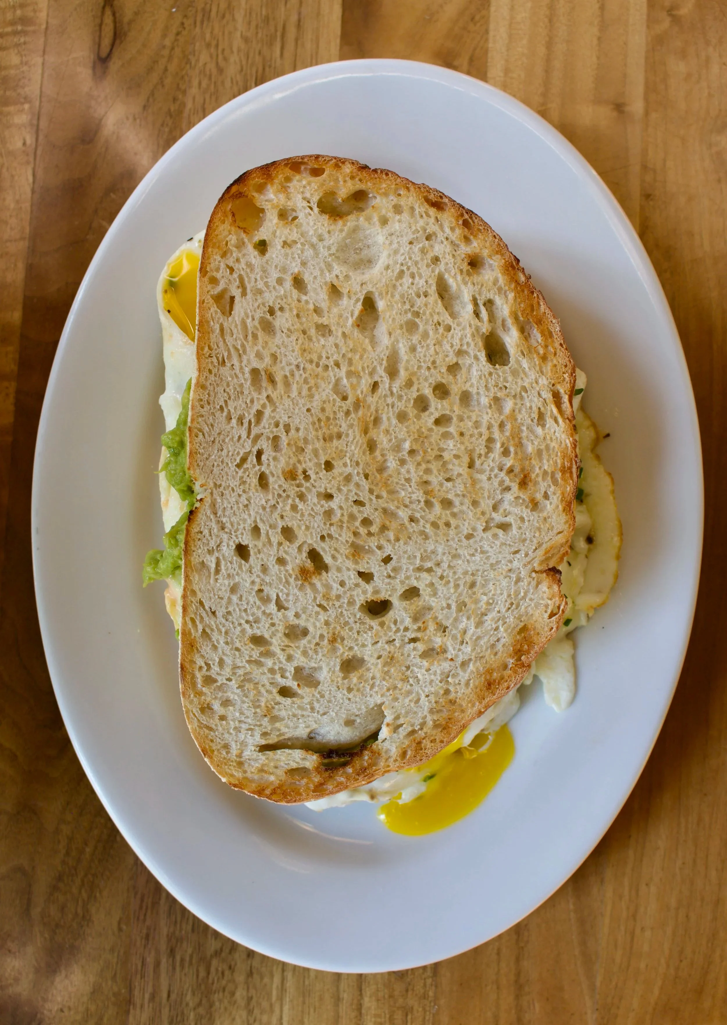 Broken Yolk Egg and Cheese Sandwich