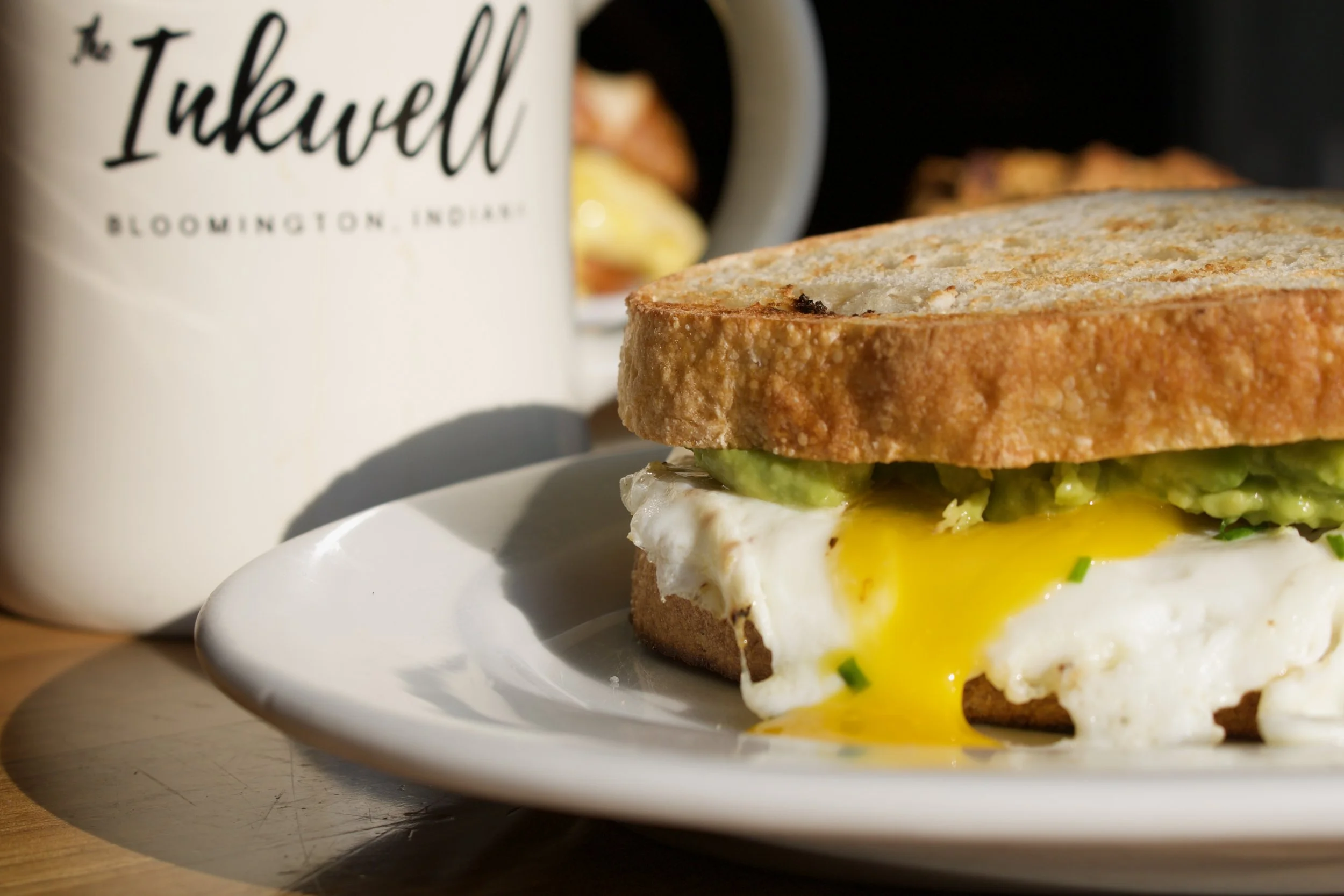Broken Yolk Egg and Cheese Sandwhich