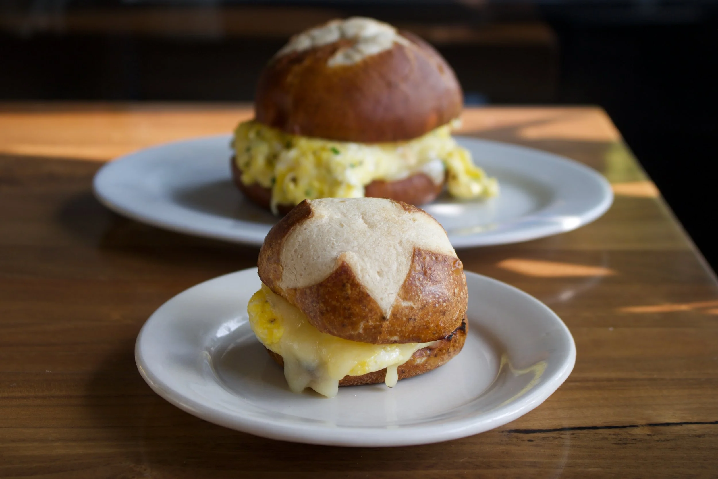 Scrambled Egg and Cheddar on Pretzel Bun