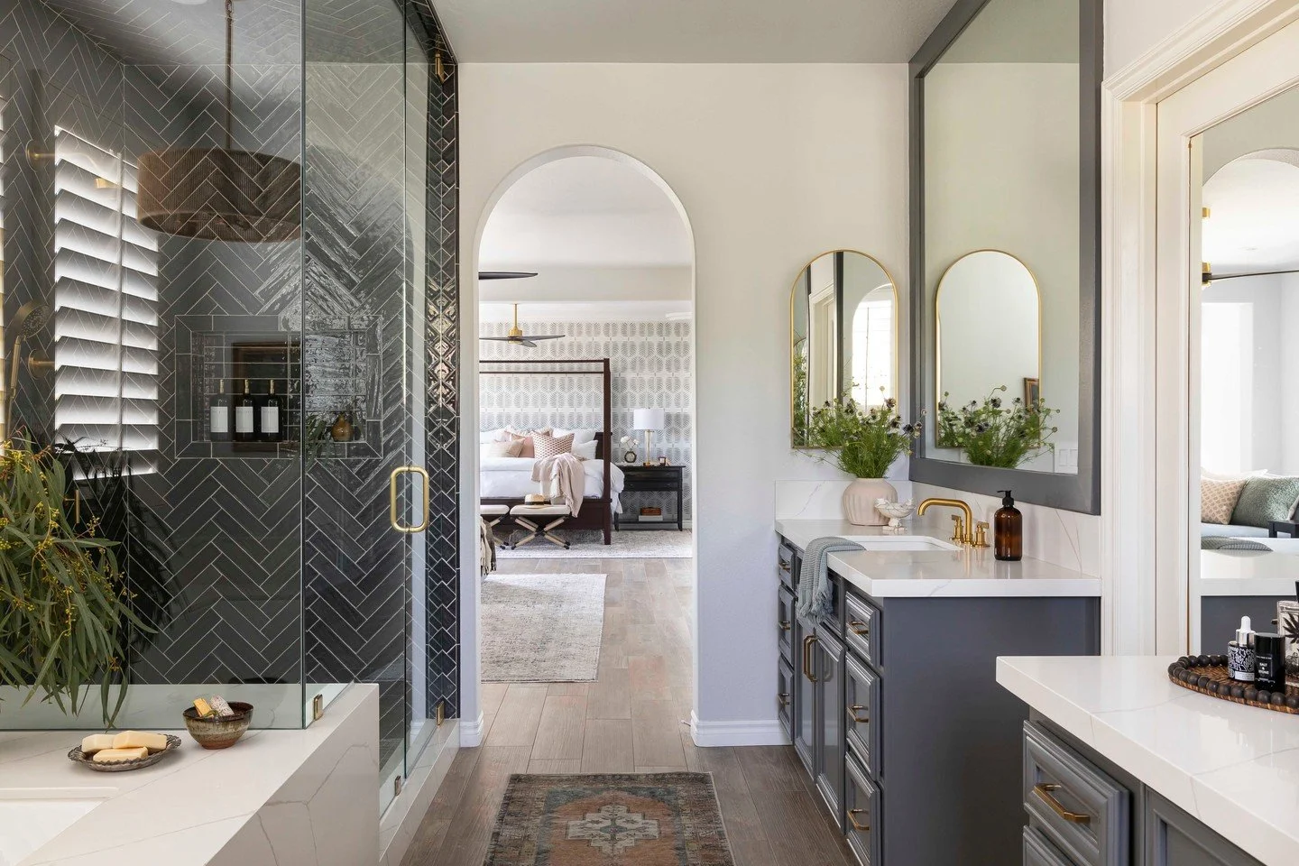The Crimson Canyon Primary Suite Bathroom

What was once a tired '90s space is now a sophisticated, feel-good retreat designed for two busy professionals to unwind in style. Layered textures, soothing tones, and smart updates turned this dated primar