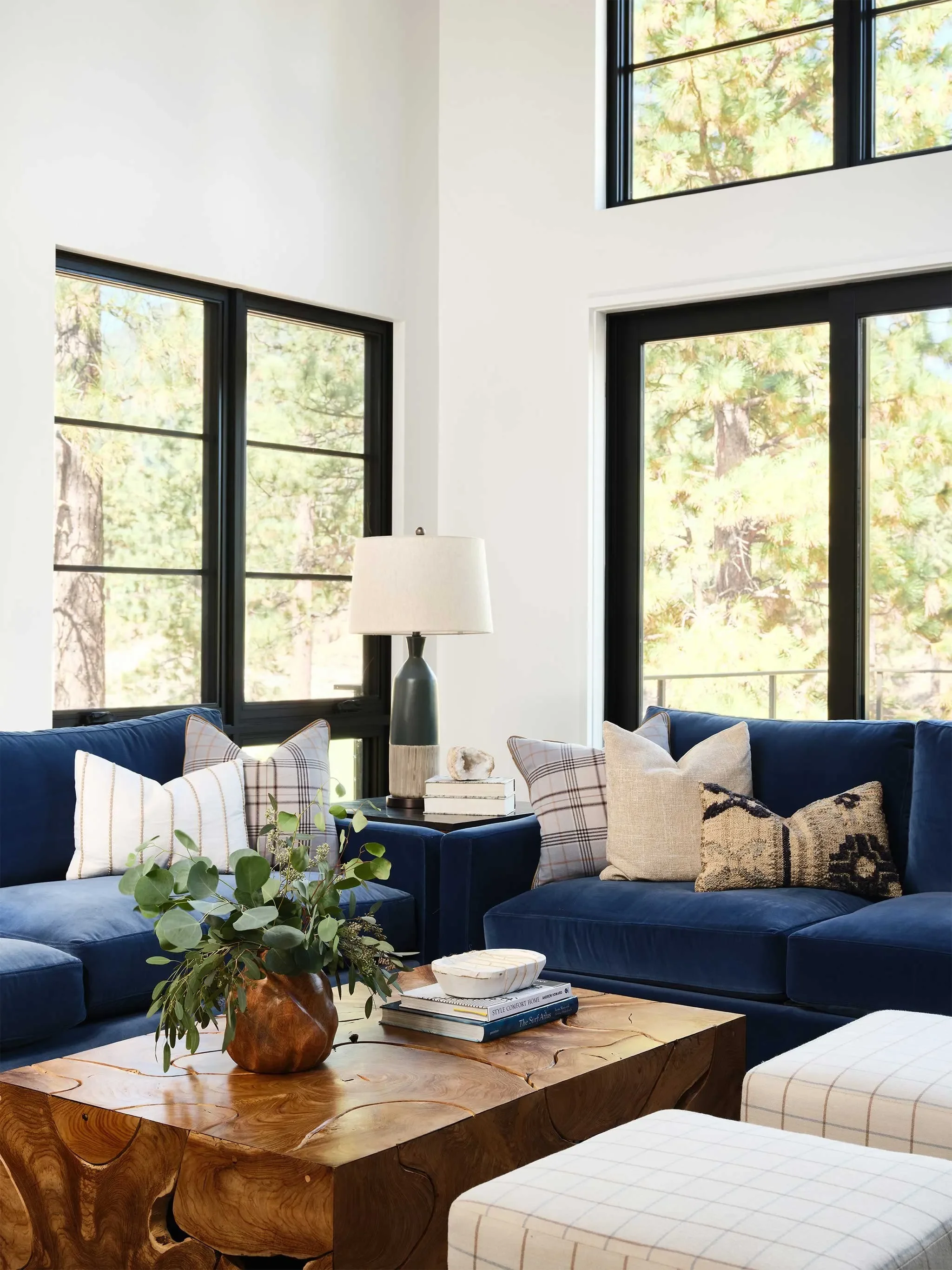 Tahoe living room with classic blue seating and natural textures, designed by JKB Home Design