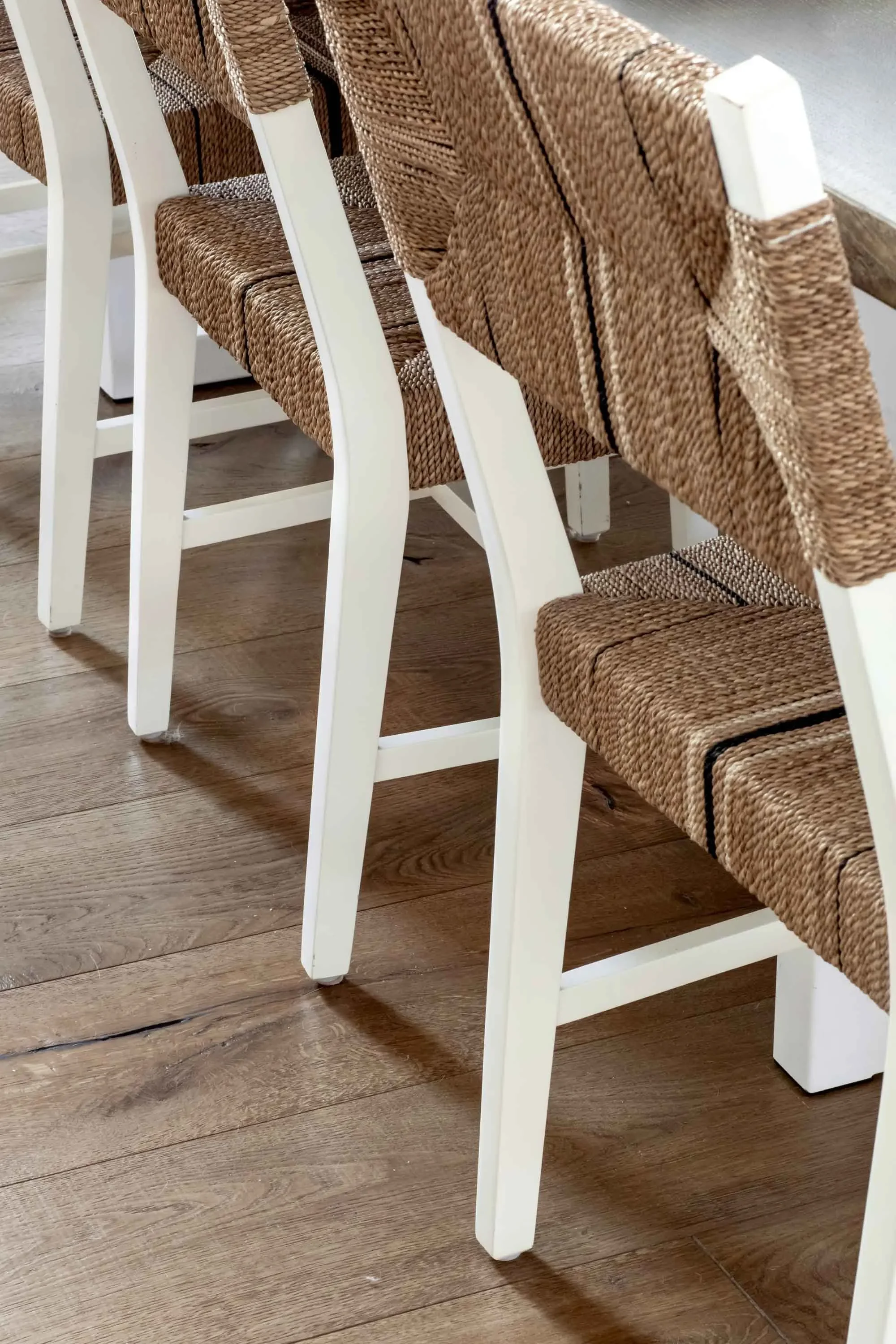 Rattan seating with natural woven texture, designed by Julie Beuerlein, interior designer
