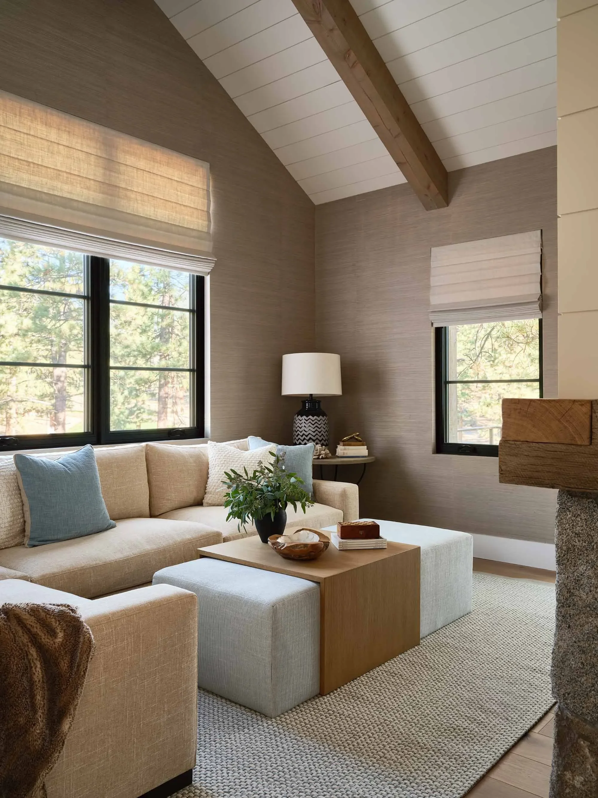 Sitting room with beams and classic furnishings, designed by Julie Beuerlein, interior designer