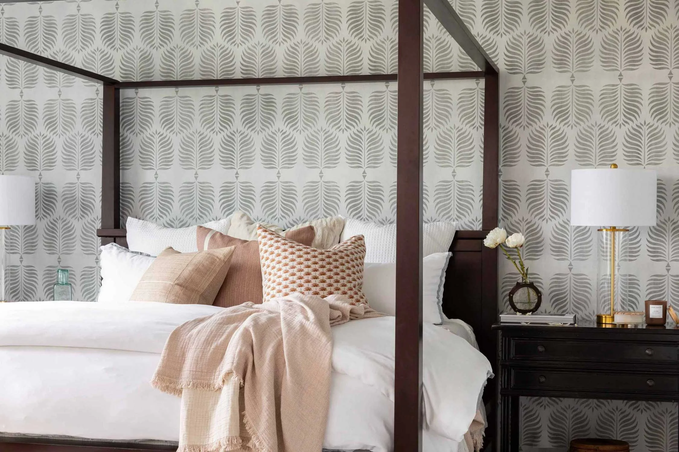 Elegant bedroom with botanical patterns and warm lighting, designed by JKB Home Design, Aliso Viejo
