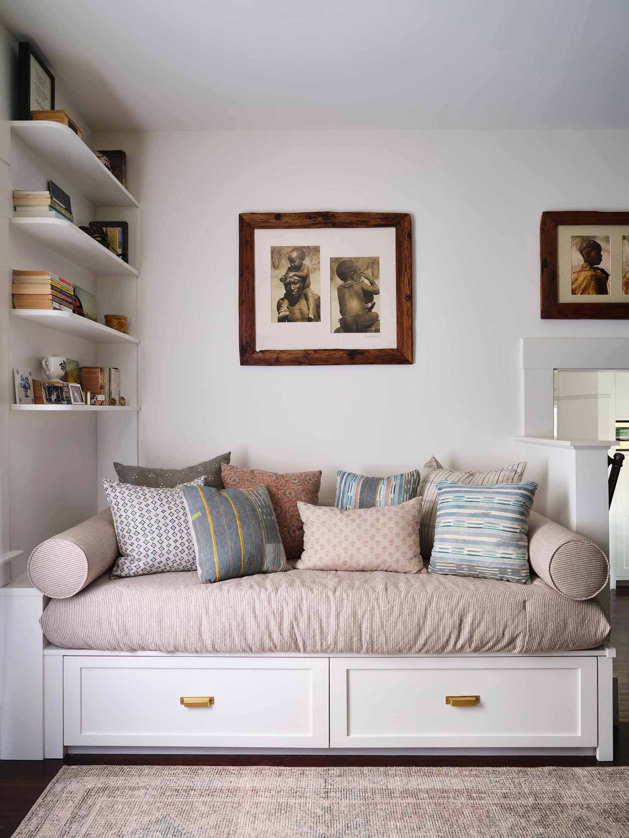 Daybed with colorful pillows in eclectic bedroom, designed by Julie Beuerlein, interior designer