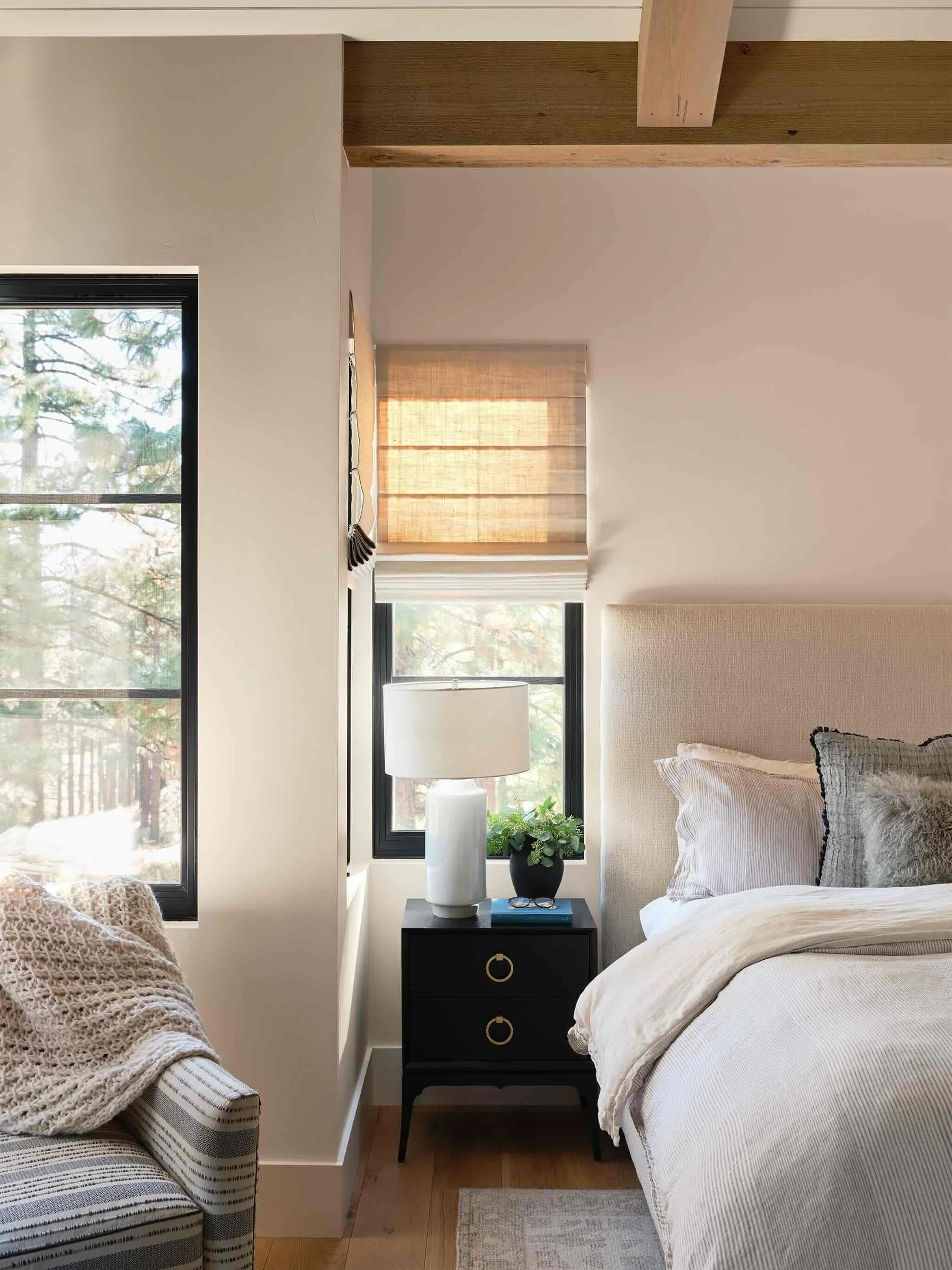 Luxury mountain bedroom with natural textures and layered furnishings at Clear Creek Tahoe, designed by JKB Home Design