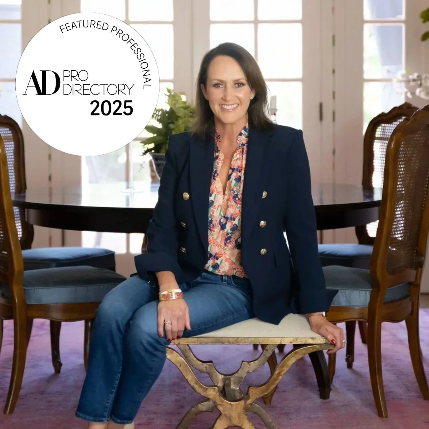 Interior designer Julie Beuerlein in her dining room, featured in AD Pro Directory