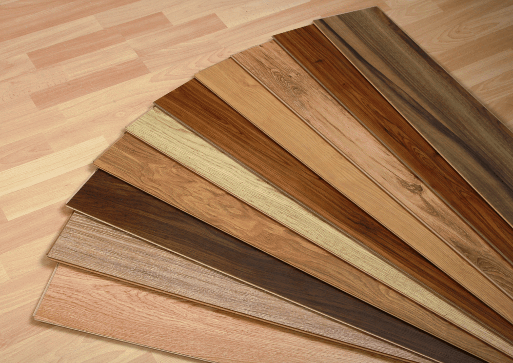 Wood-look flooring samples showing durable flooring options for a family-friendly home