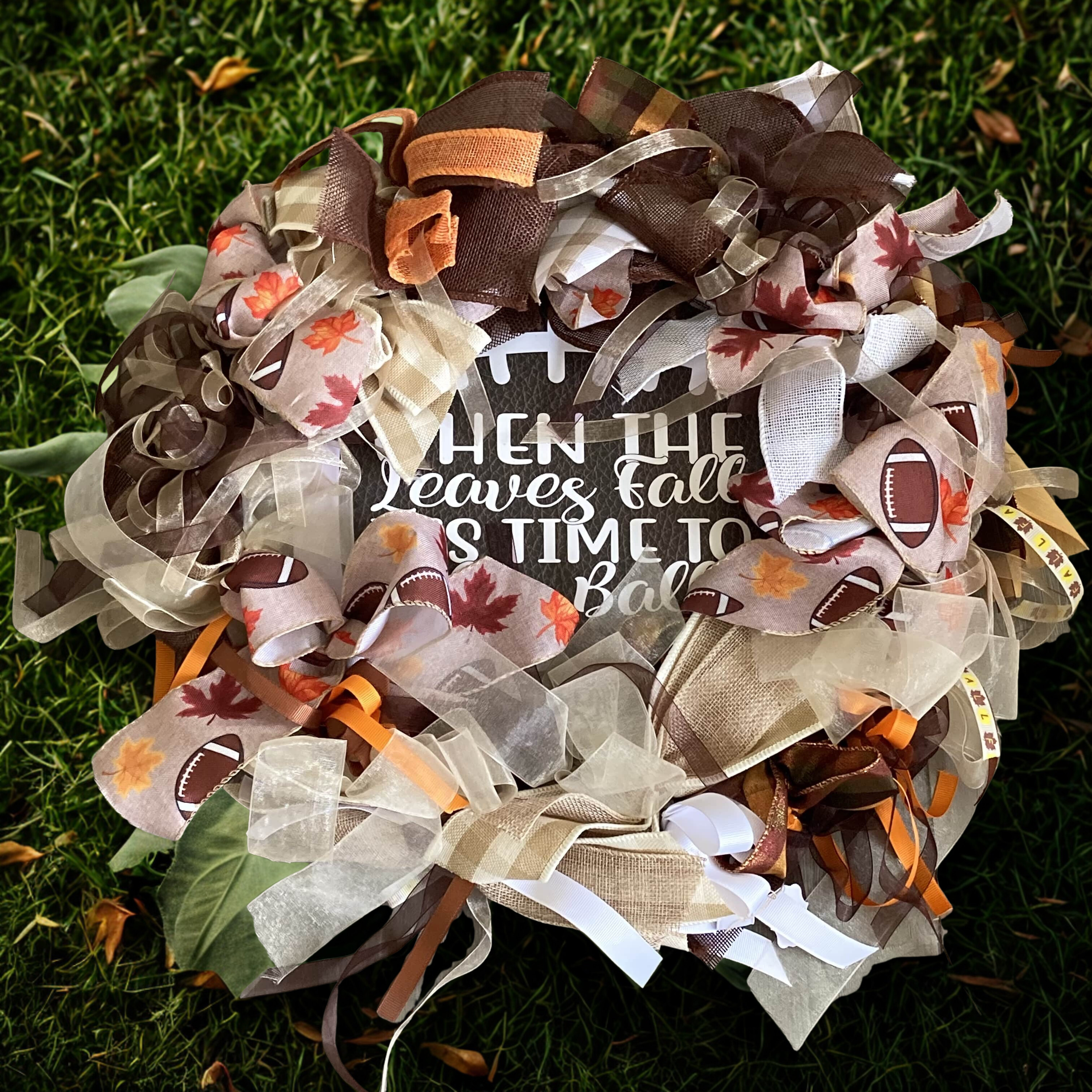 football wreath grass background.png