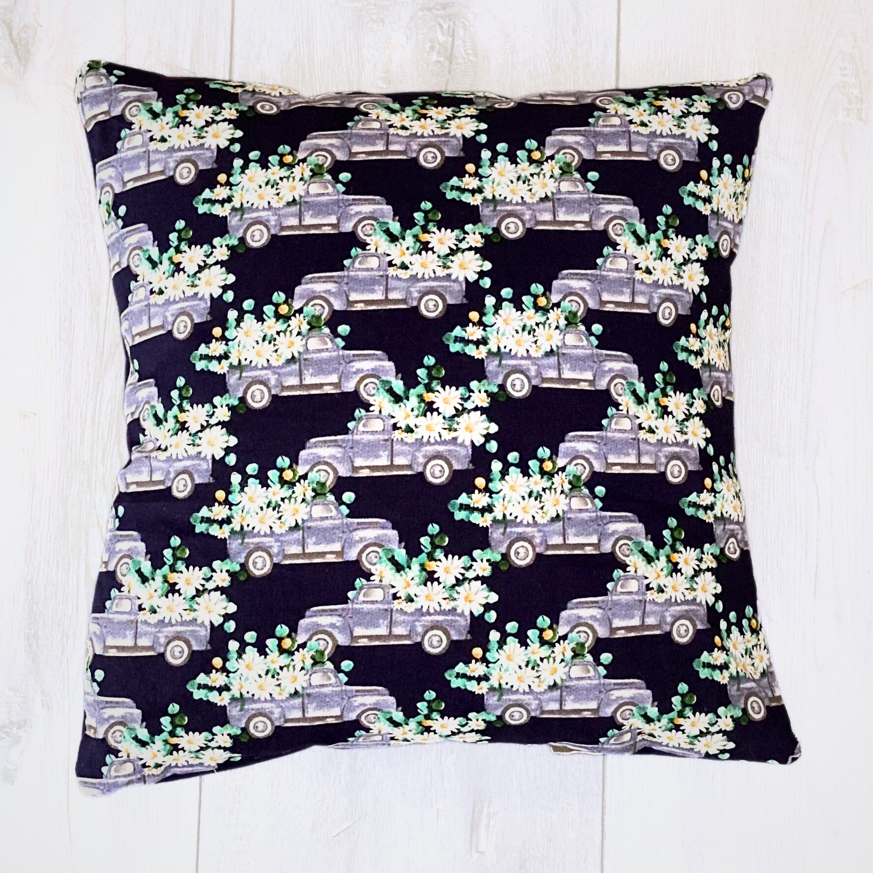 blue truck daisies pillow.png