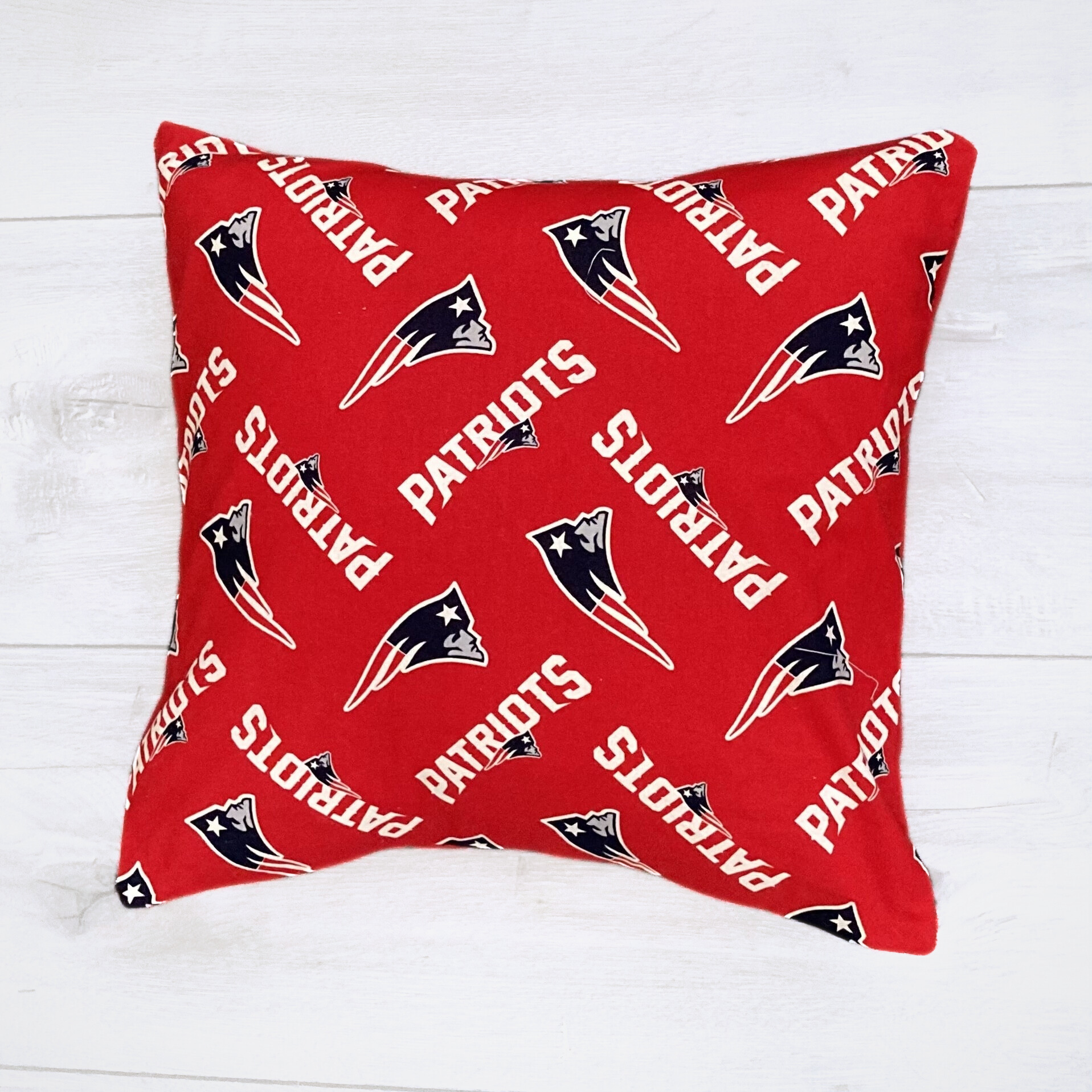 patriots red pillow.png