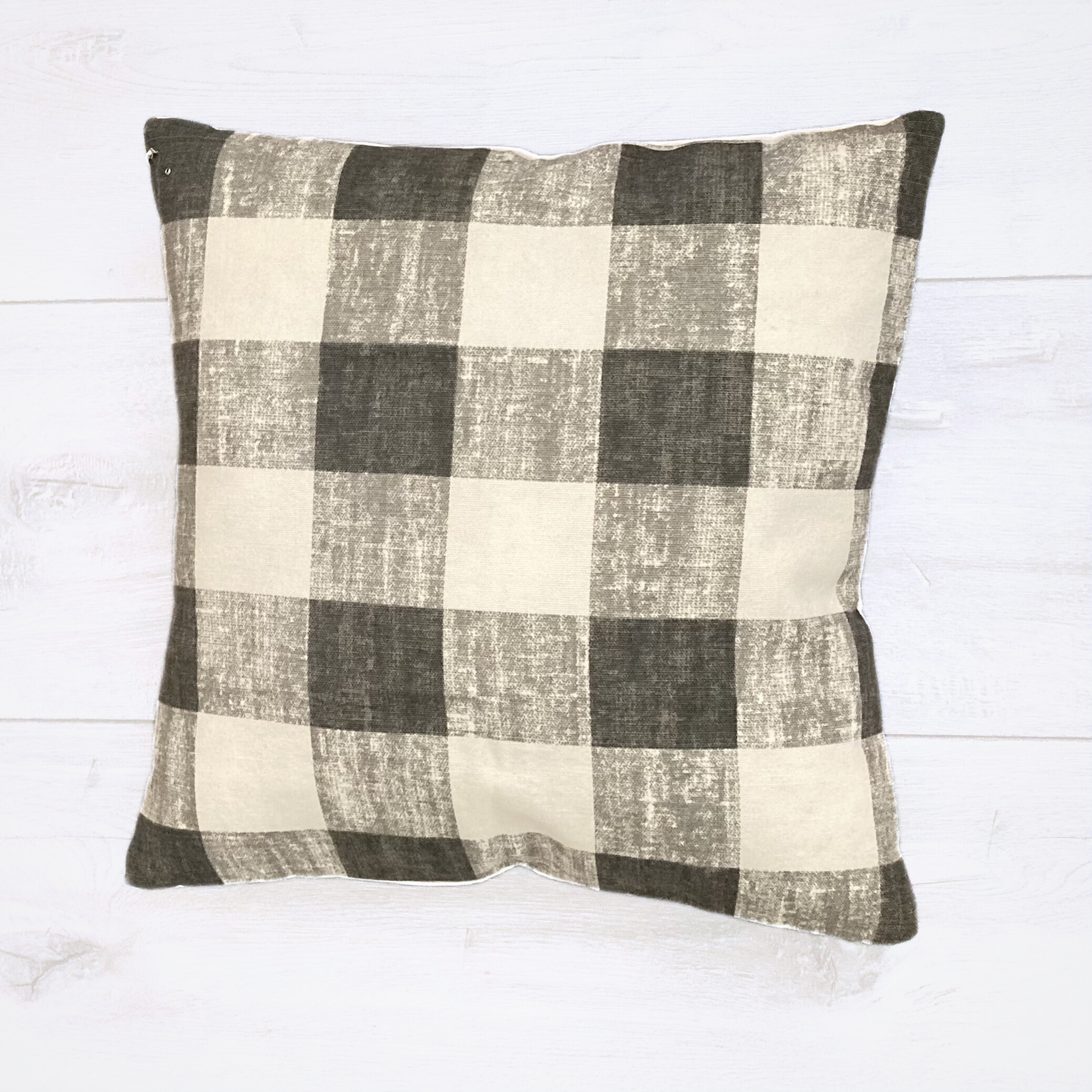 gray white buff ck pillow.png