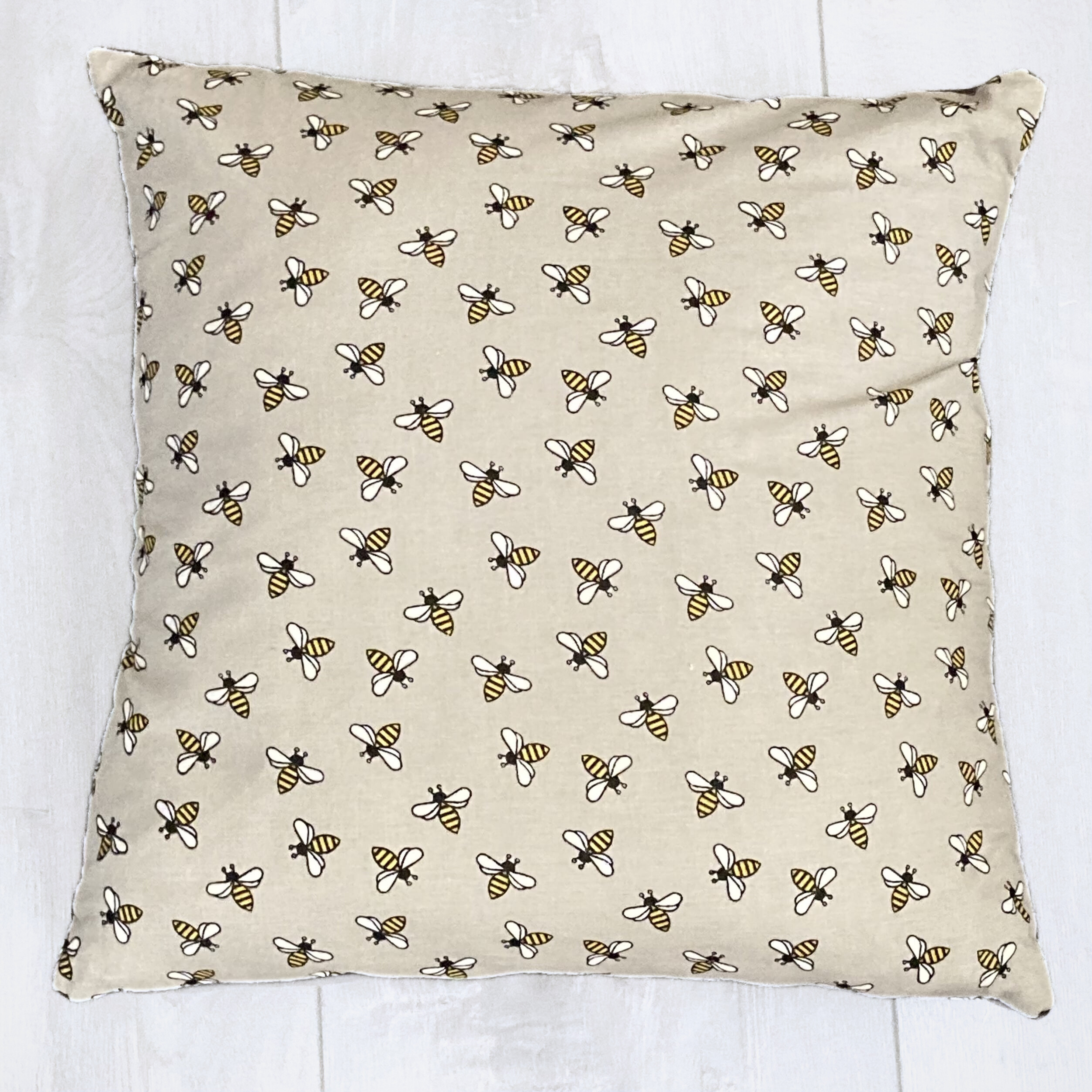 gray with bees pillow.png