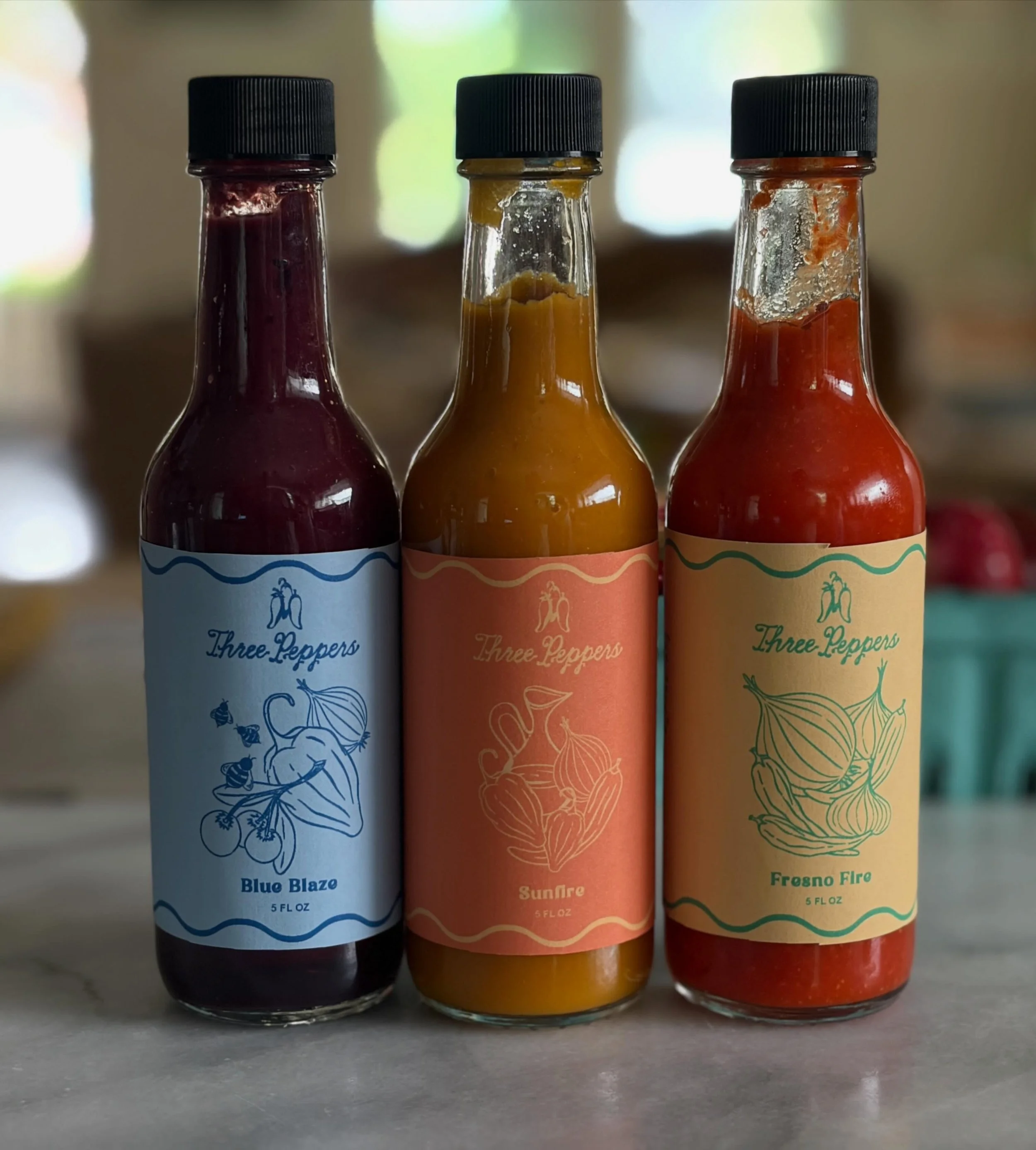 Labels are locked.  One of my three peppers suggested we add wizards and explosions to Blue Blaze.  Still considering it.

Three sauces.  Three completely different flavor profiles.  All small batch, all clean label.

Kickstarter dropping soon &ndash