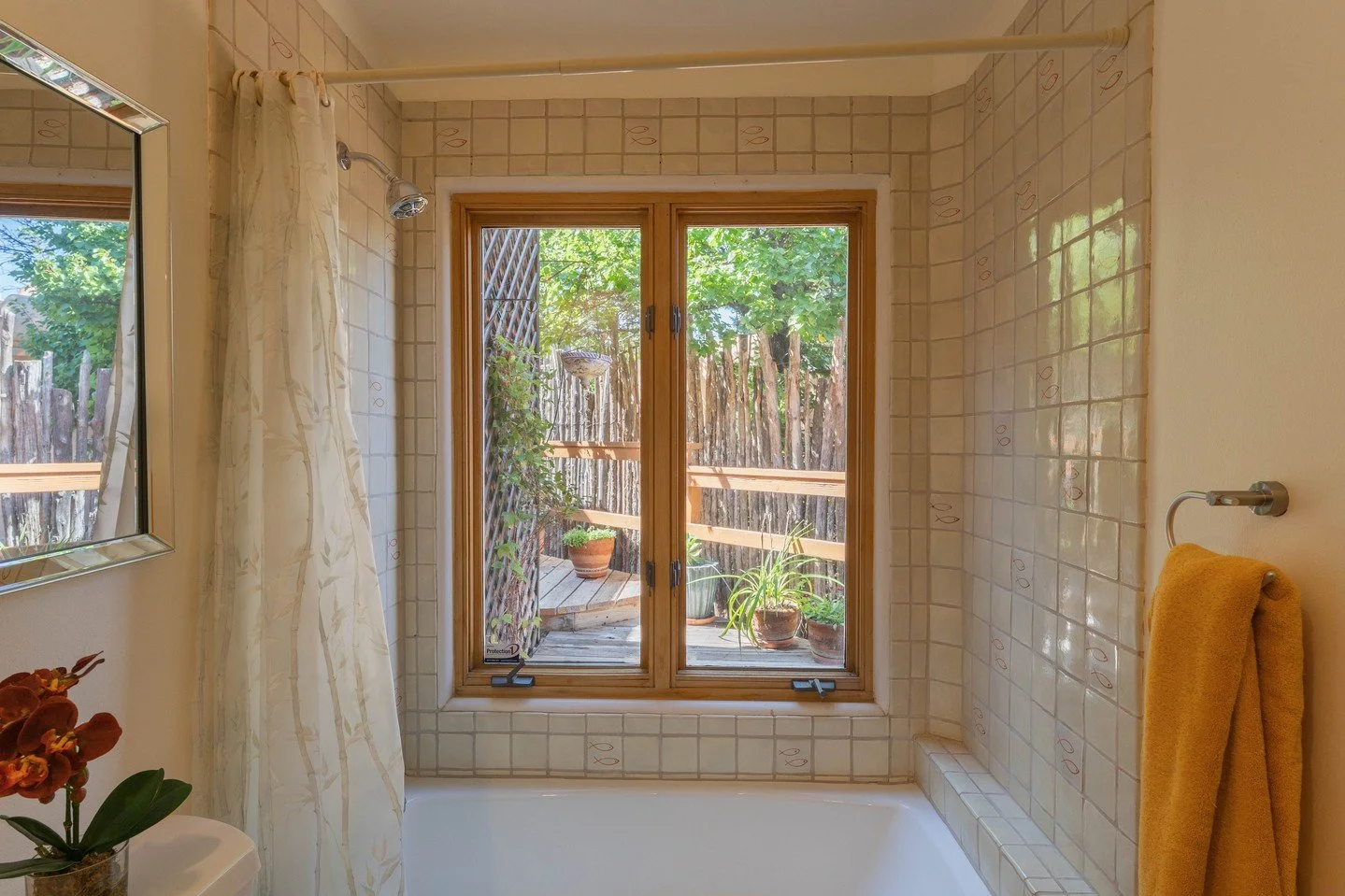 Starting the week with some serious bathroom goals! ✨ Imagine soaking it all in with this incredible Santa Fe view as your backdrop. At Open House Creative Co., we capture the details that make a difference. #SantaFeRealEstatePhotography #LuxuryHomes