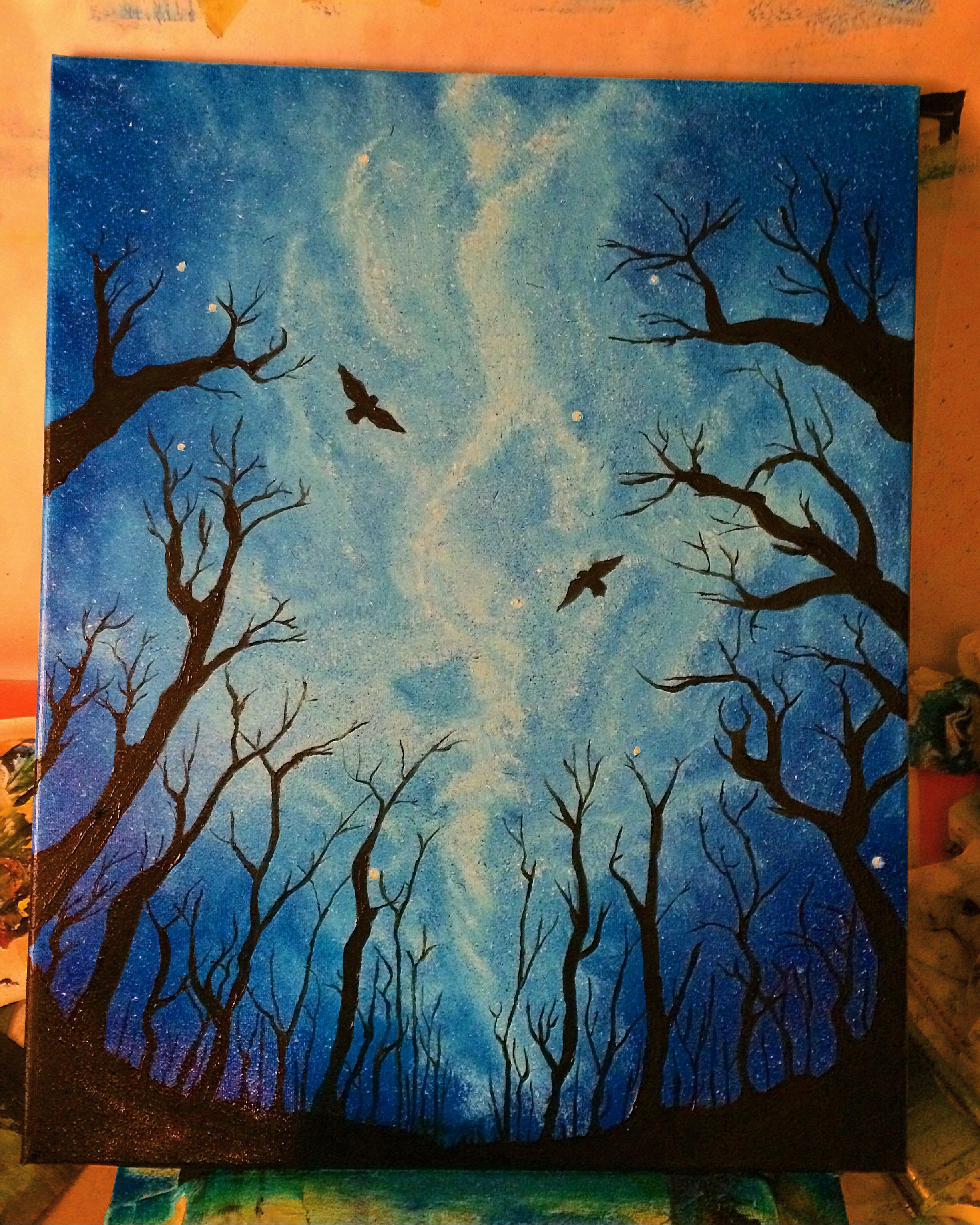 A painting of leafless trees silhouetted against a starry night sky with a swirling blue and white nebula and two flying birds.