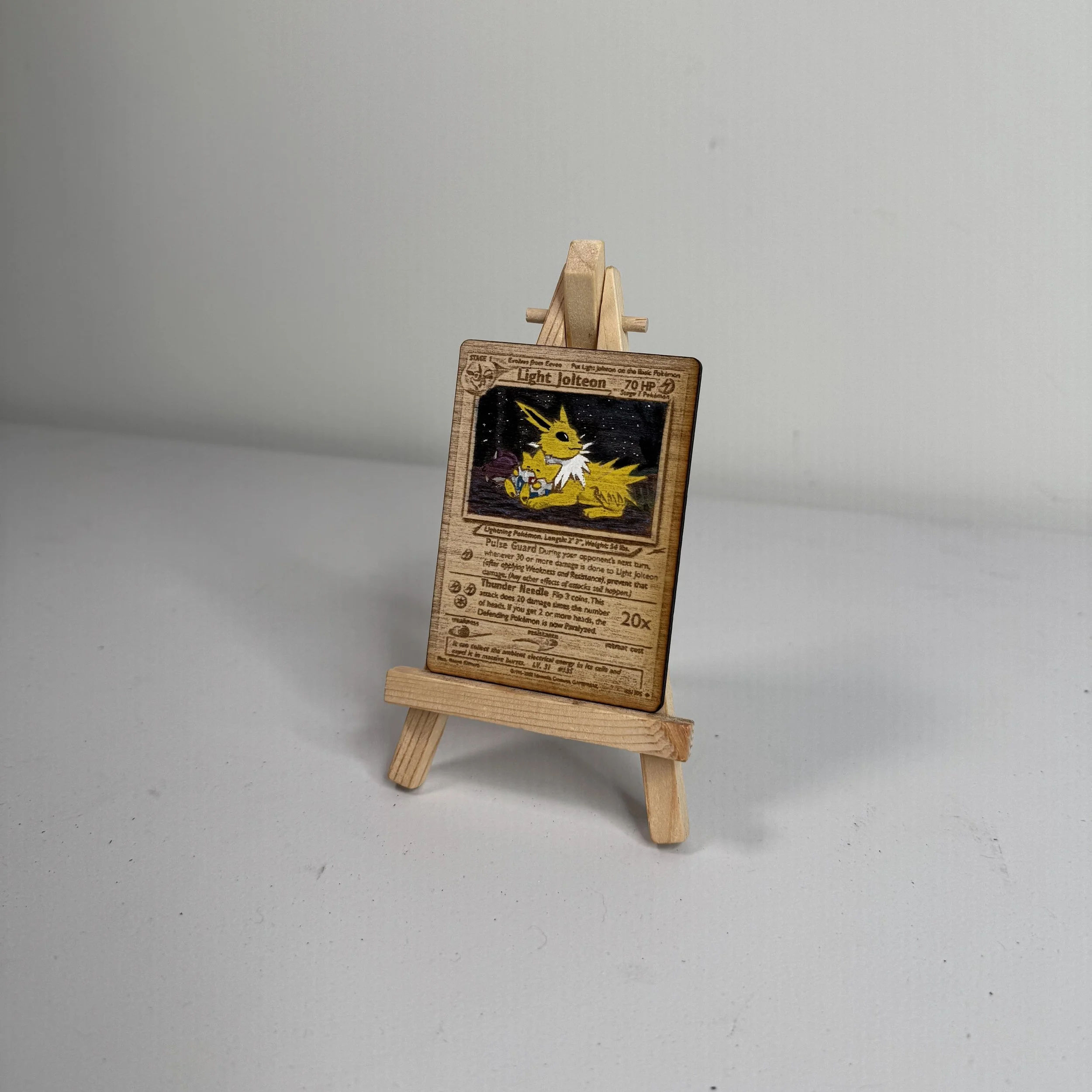 Light Jolteon (48) Engraved Wooden TCG Card