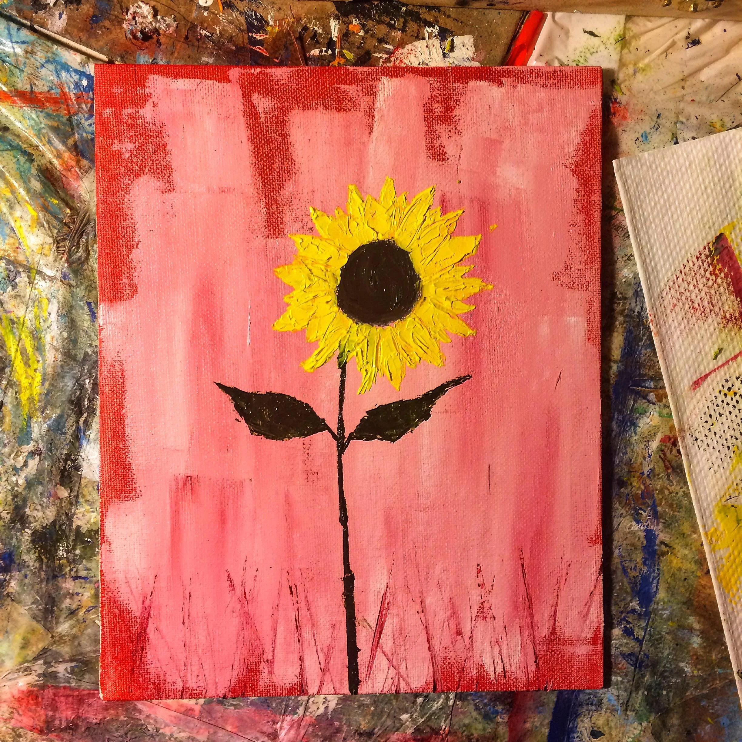 Painting of a sunflower with yellow petals and dark center on a pink background.