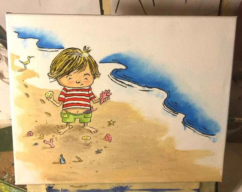 A cheerful child with blonde hair playing on the beach, holding a pink shell and a yellow starfish, surrounded by seashells, starfish, and beach toys, with the ocean in the background.