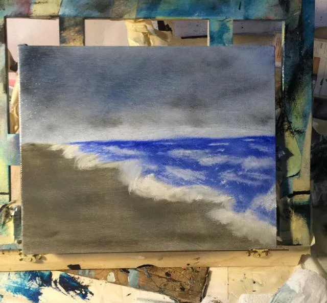 Painting of waves crashing onto a beach under a cloudy sky.