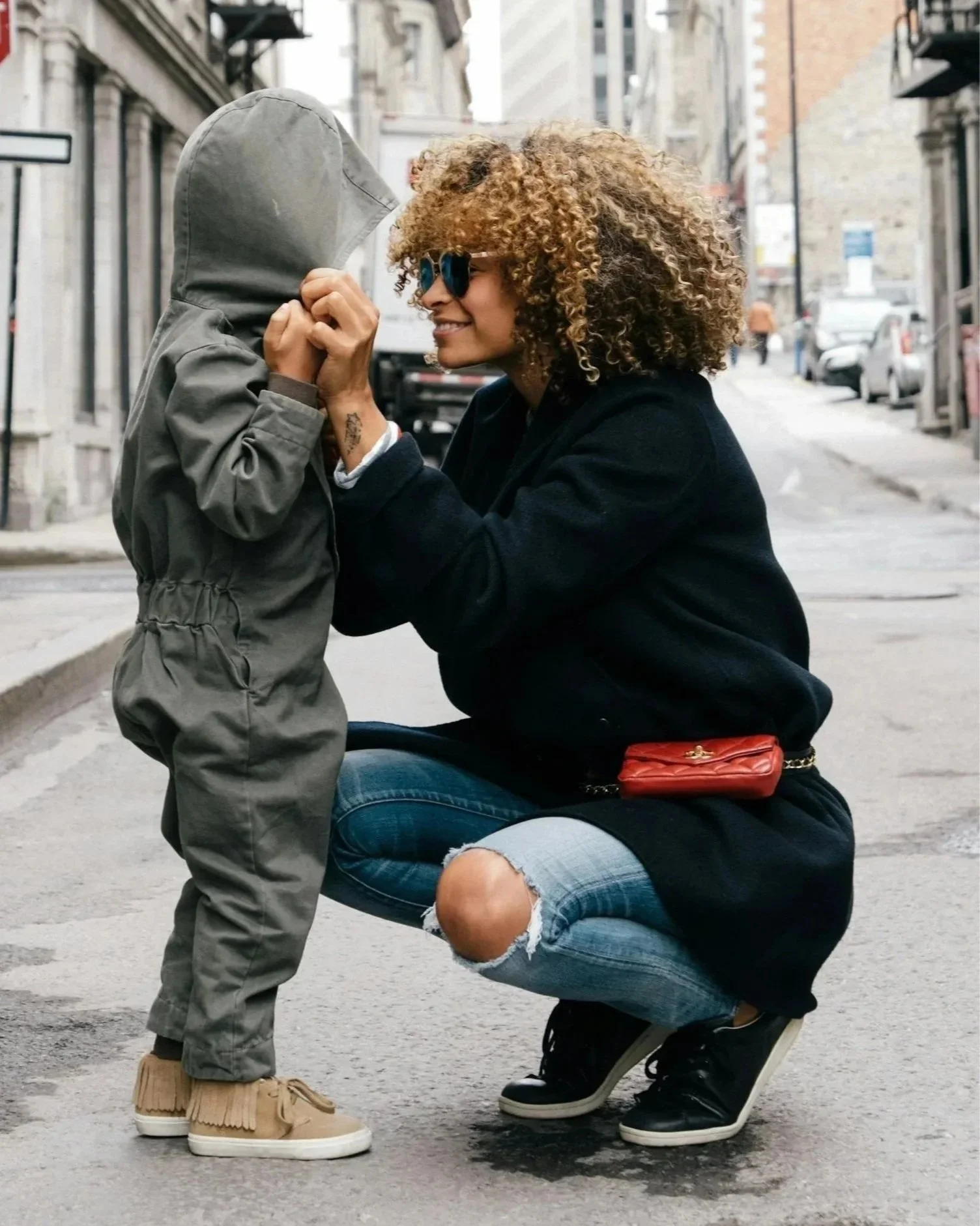 parent caregiver embracing small child reconnecting with the present moment