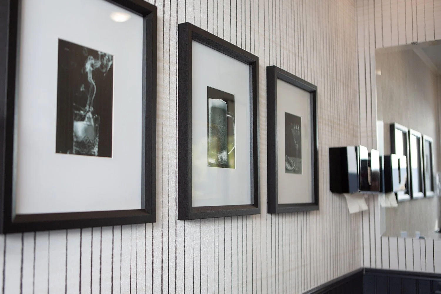dramatic interior with dark finishes and subtle accent lighting
