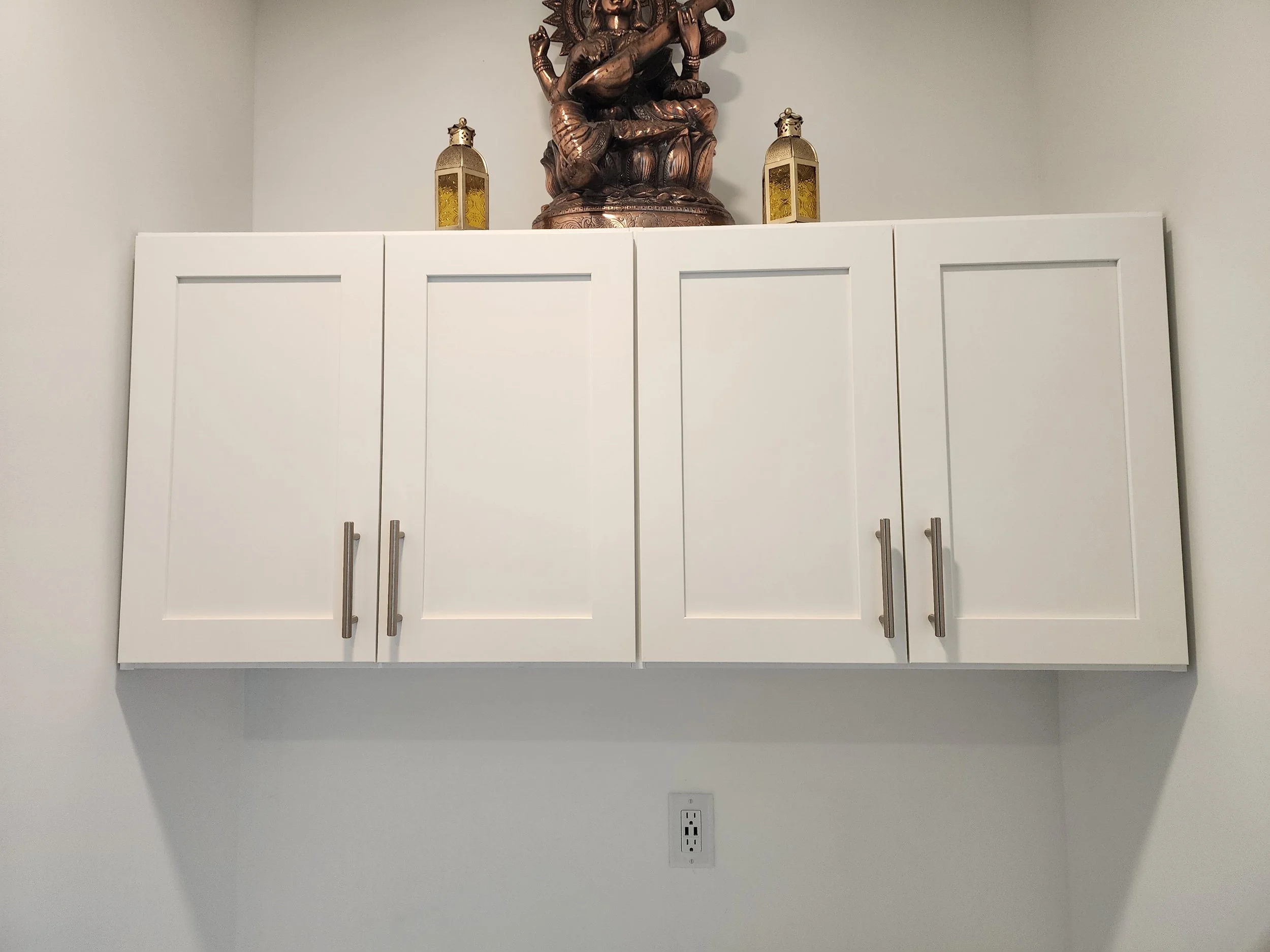 Shaker style doors on cabinets installed in the desk bump out off the kitchen