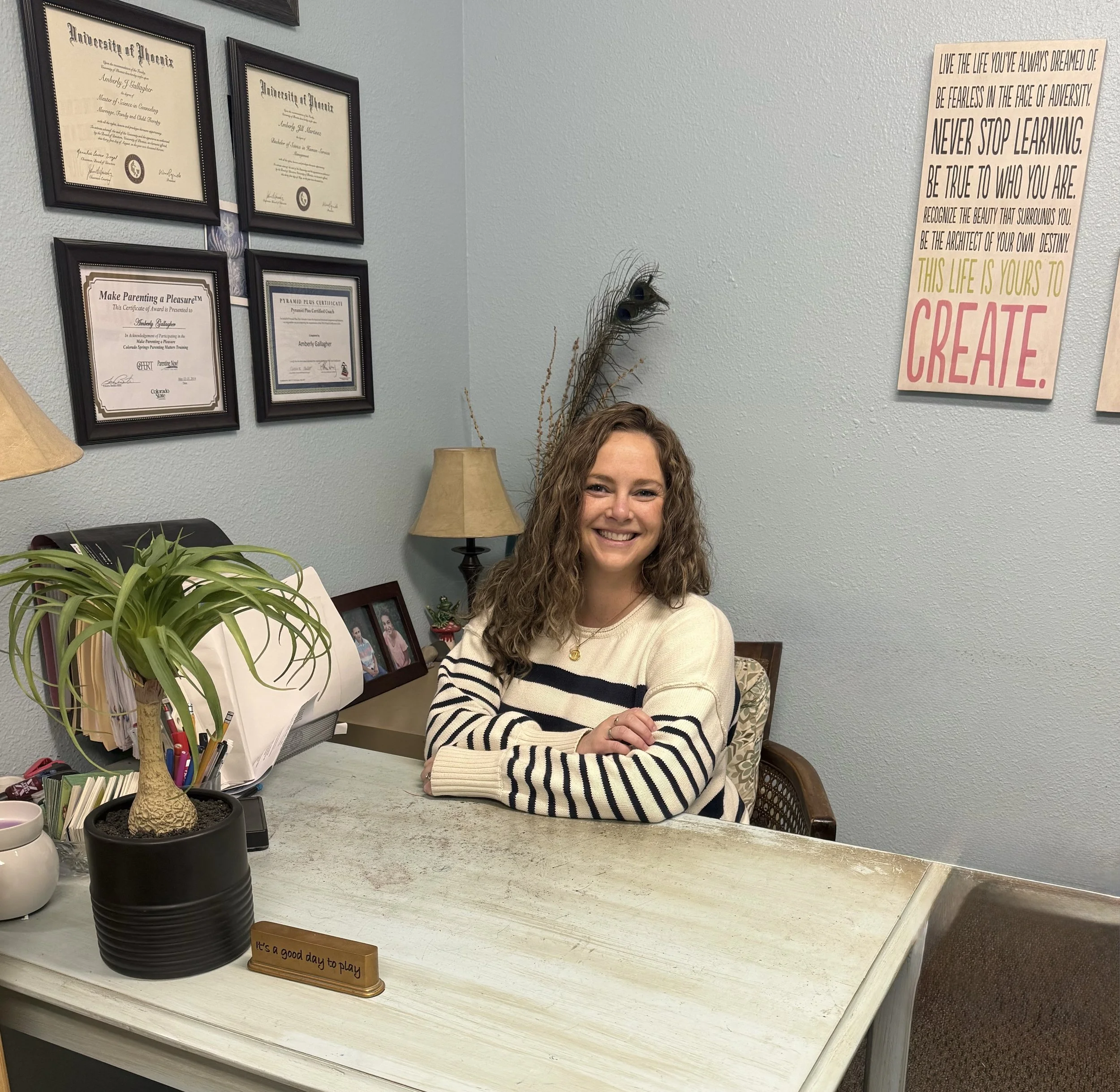 Rose Mesick, LPC sitting in a therapy office.