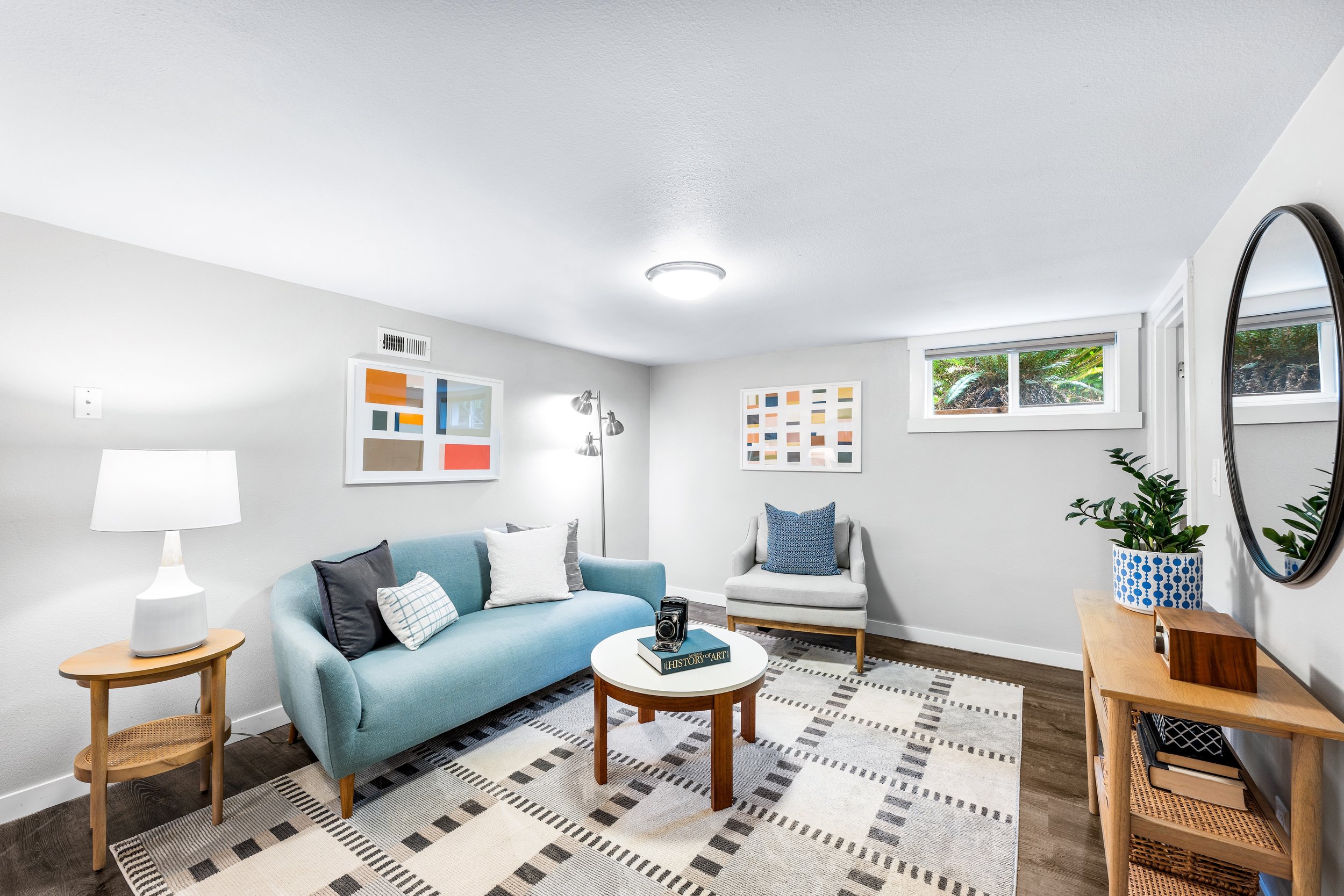 Real estate photo of a living room in a downstairs ADU in Portland, Oregon