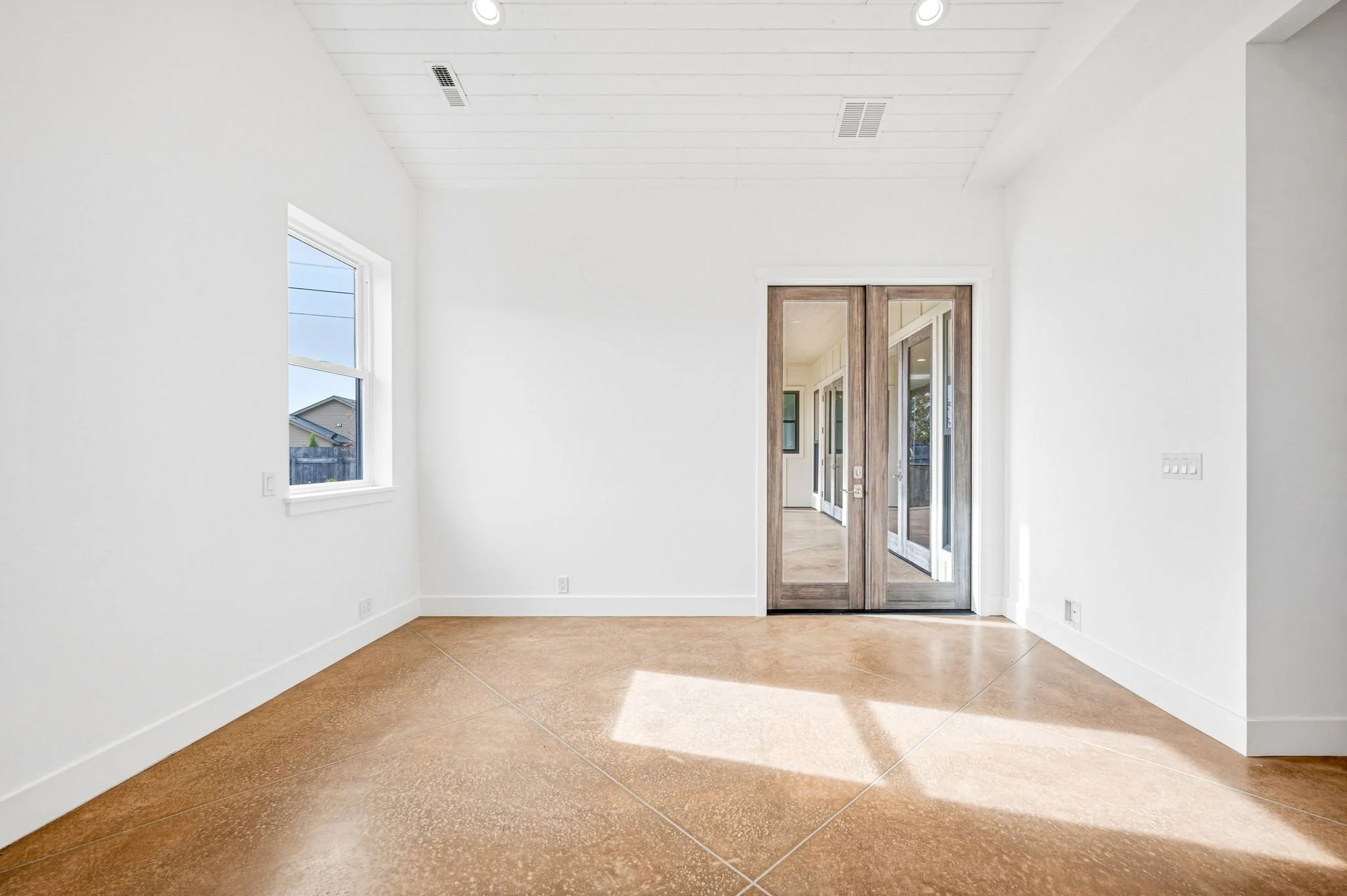 "Before" photo of an empty office prior to being virtually staged