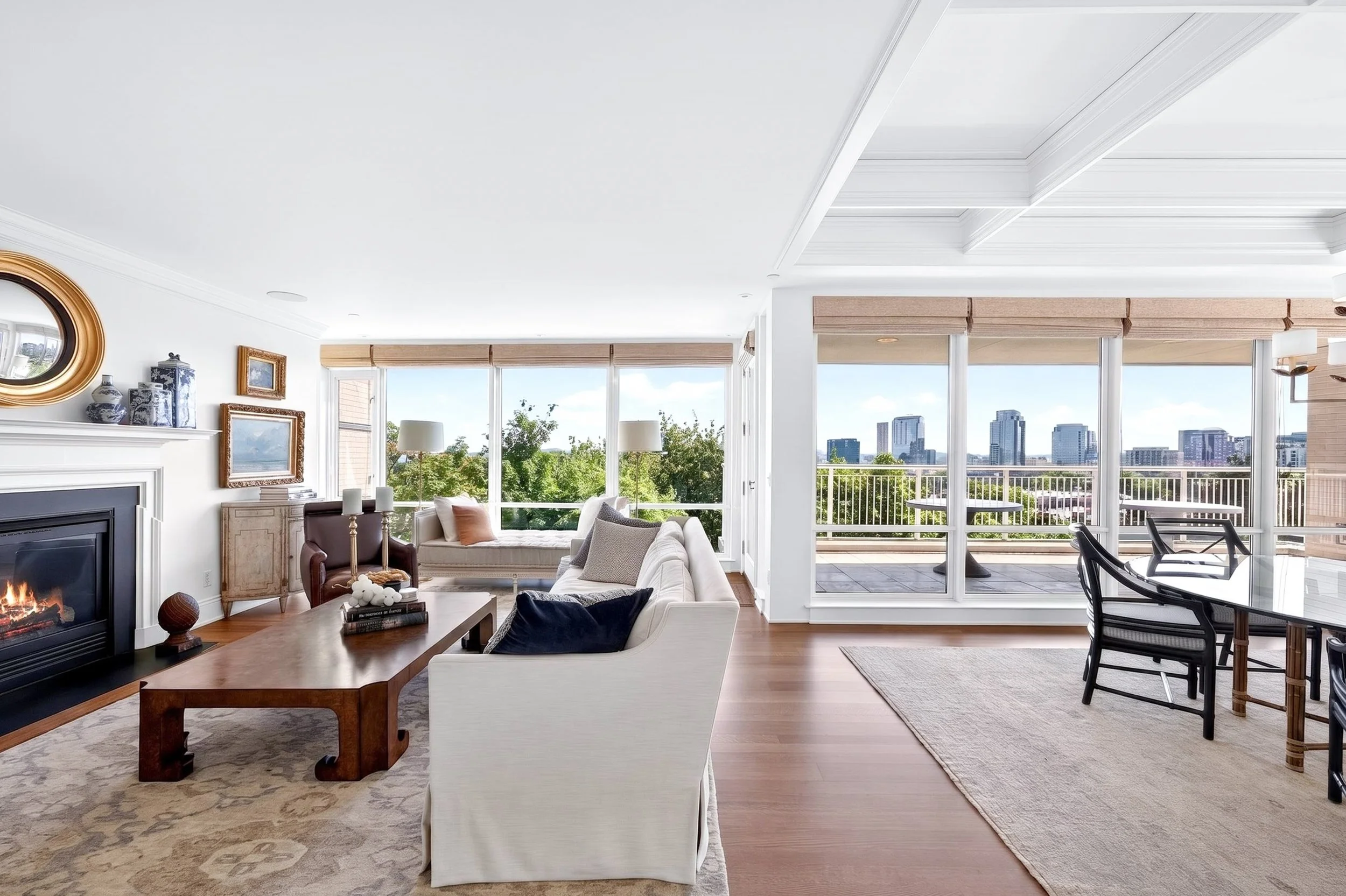 Southwest Portland condo featuring a living room with a skyline view
