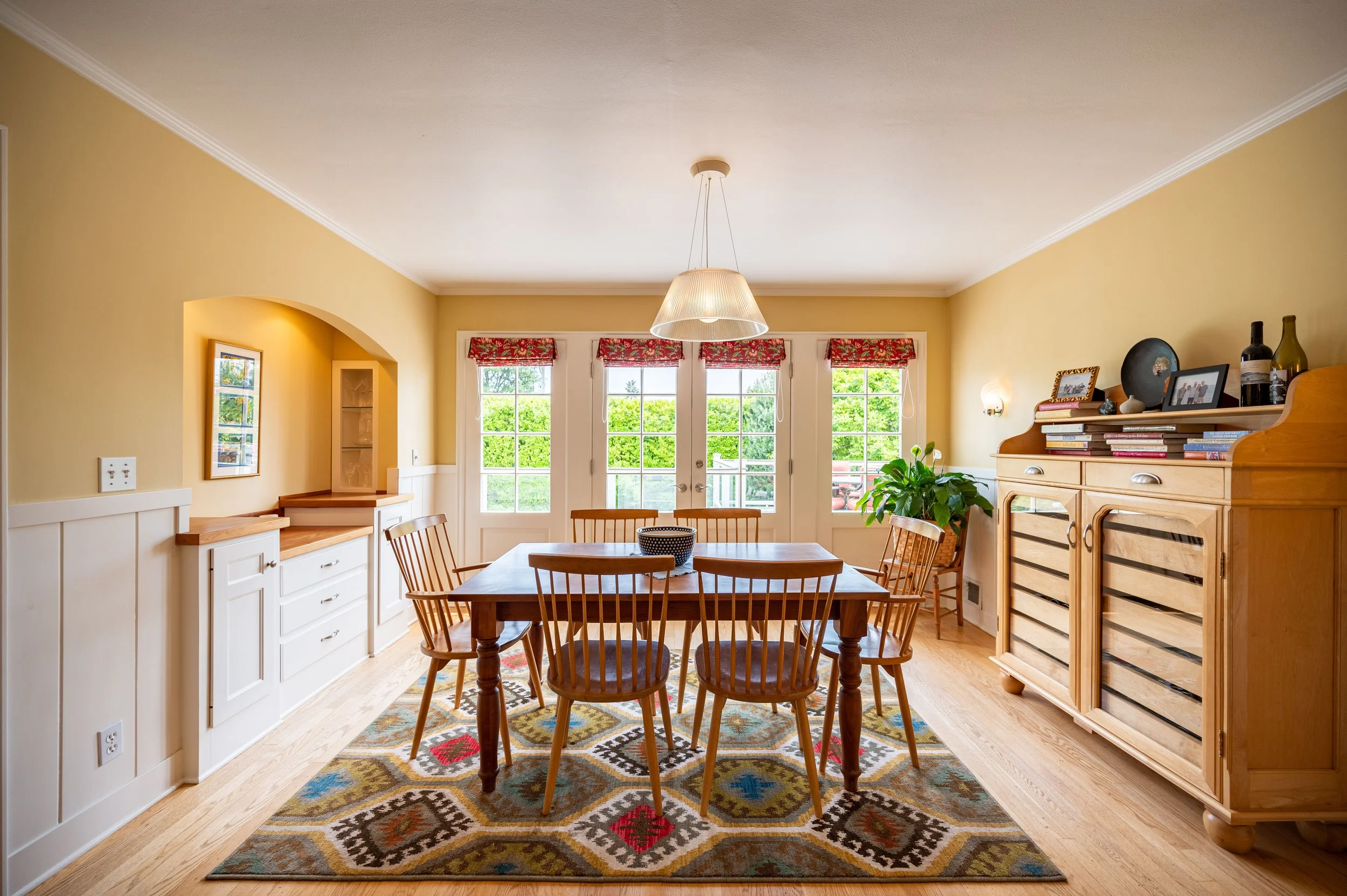 Wide kitchen view with island seating and open layout