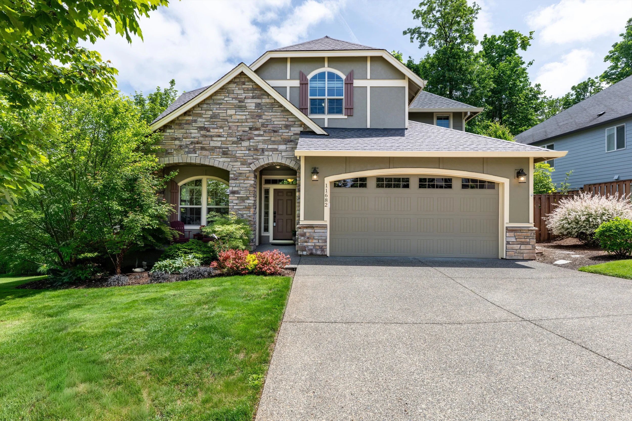 Front exterior photo of a traditional home in Beaverton, Oregon
