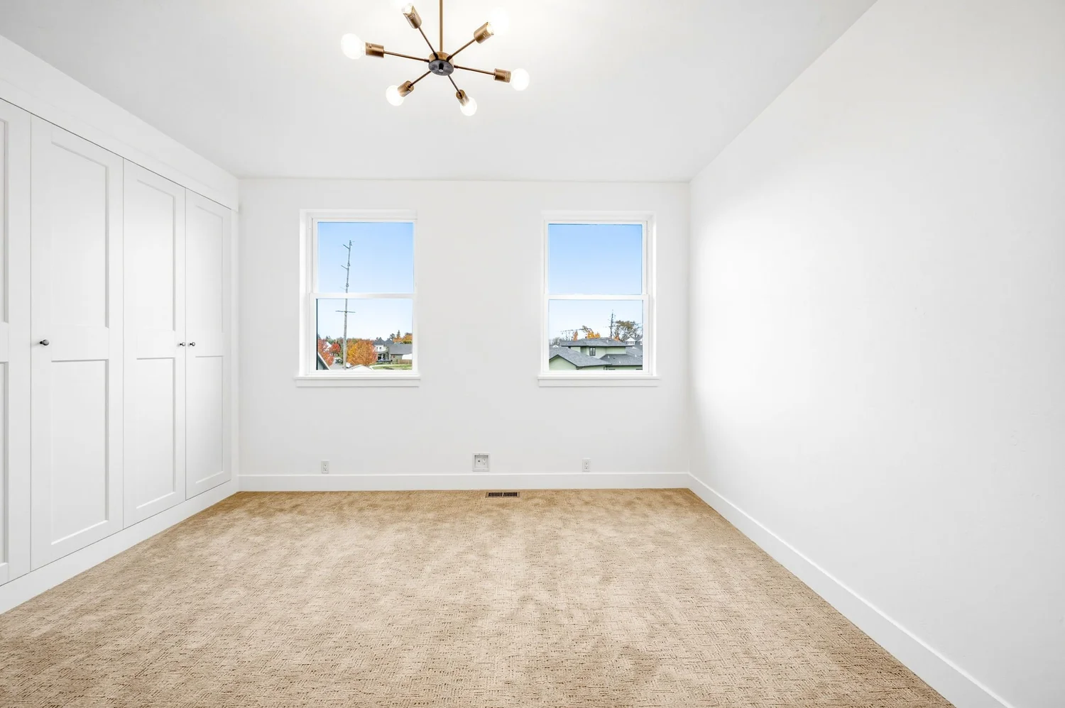Before — empty bedroom prior to virtual staging