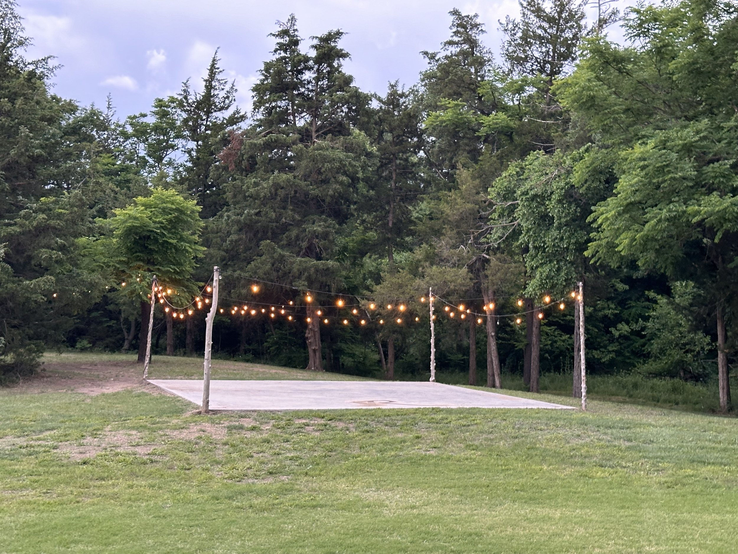 The outdoor dance floor serves as a wonderful area to have a first dance and those special Father/Daughter and Mother/Son dances. Lights add a charm and keep the party going all evening.