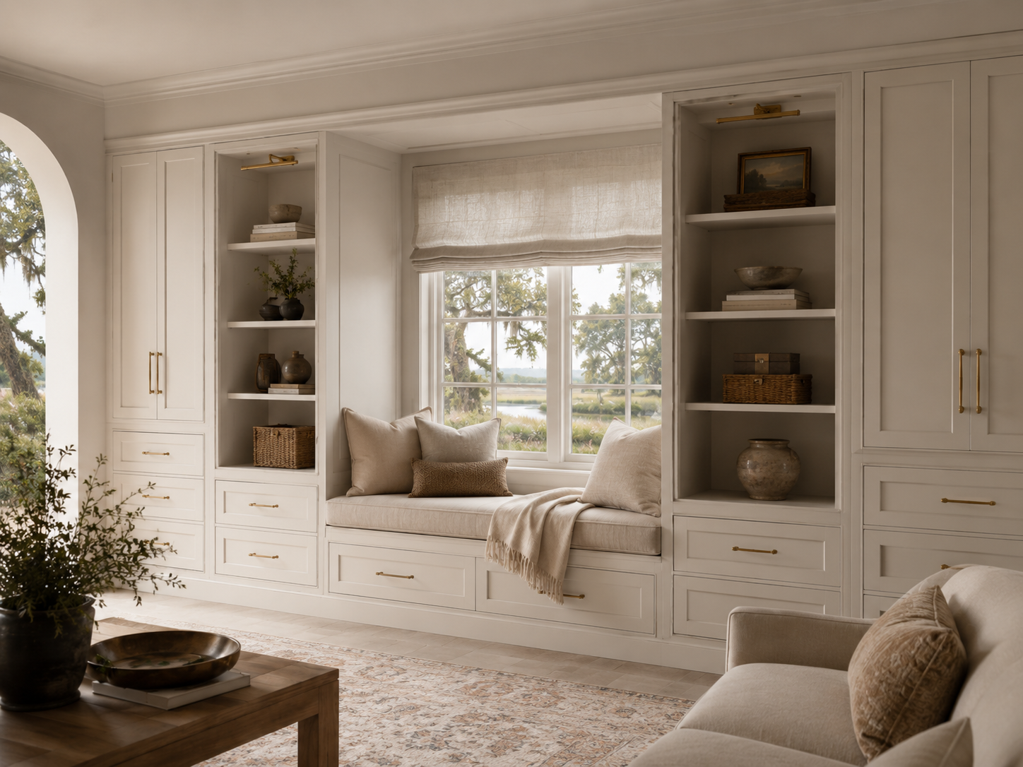 Elegant farmhouse living room with window seat.png