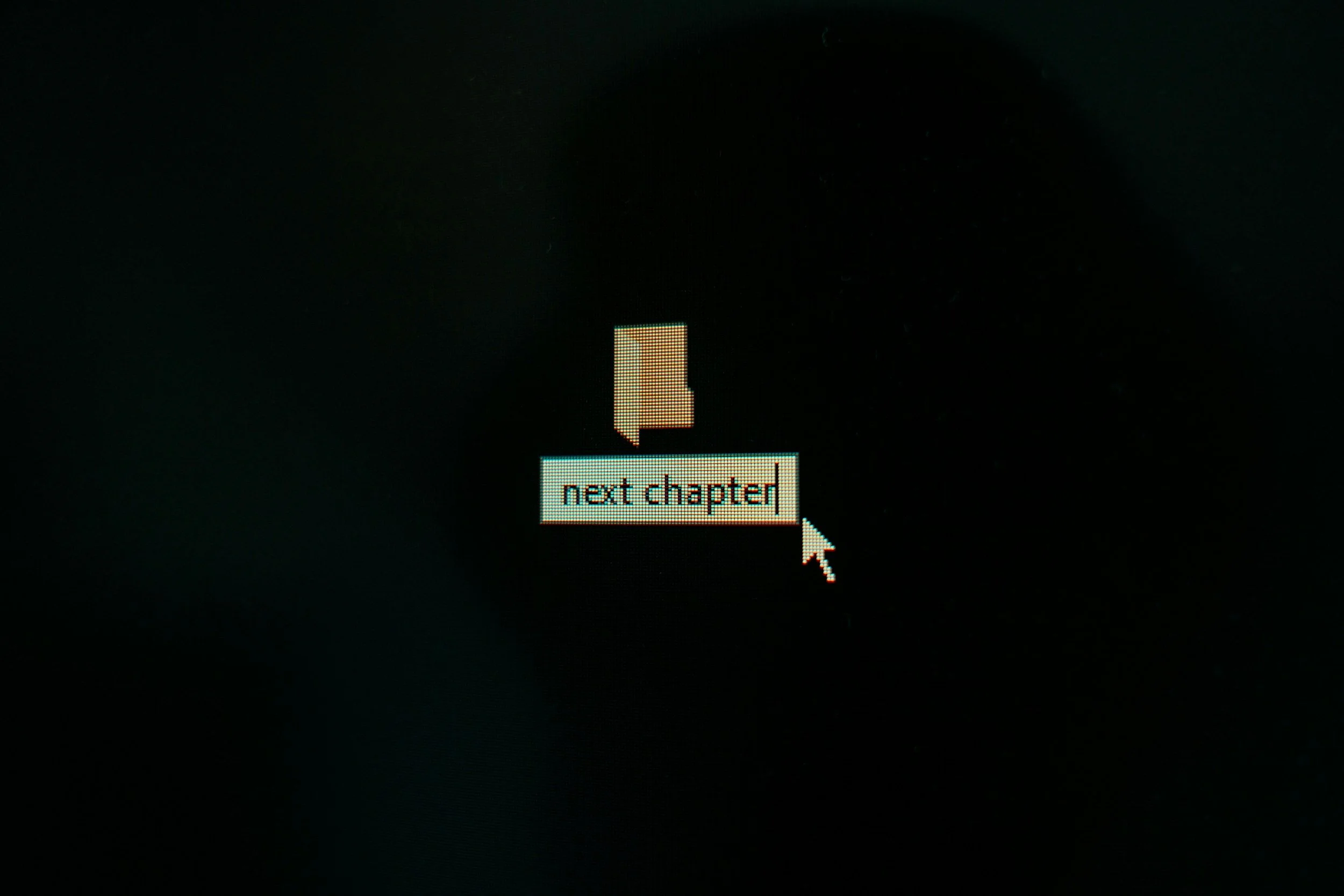 A computer screen showing a cursor clicking on a text box labeled "next chapter" with a small folder icon above it.