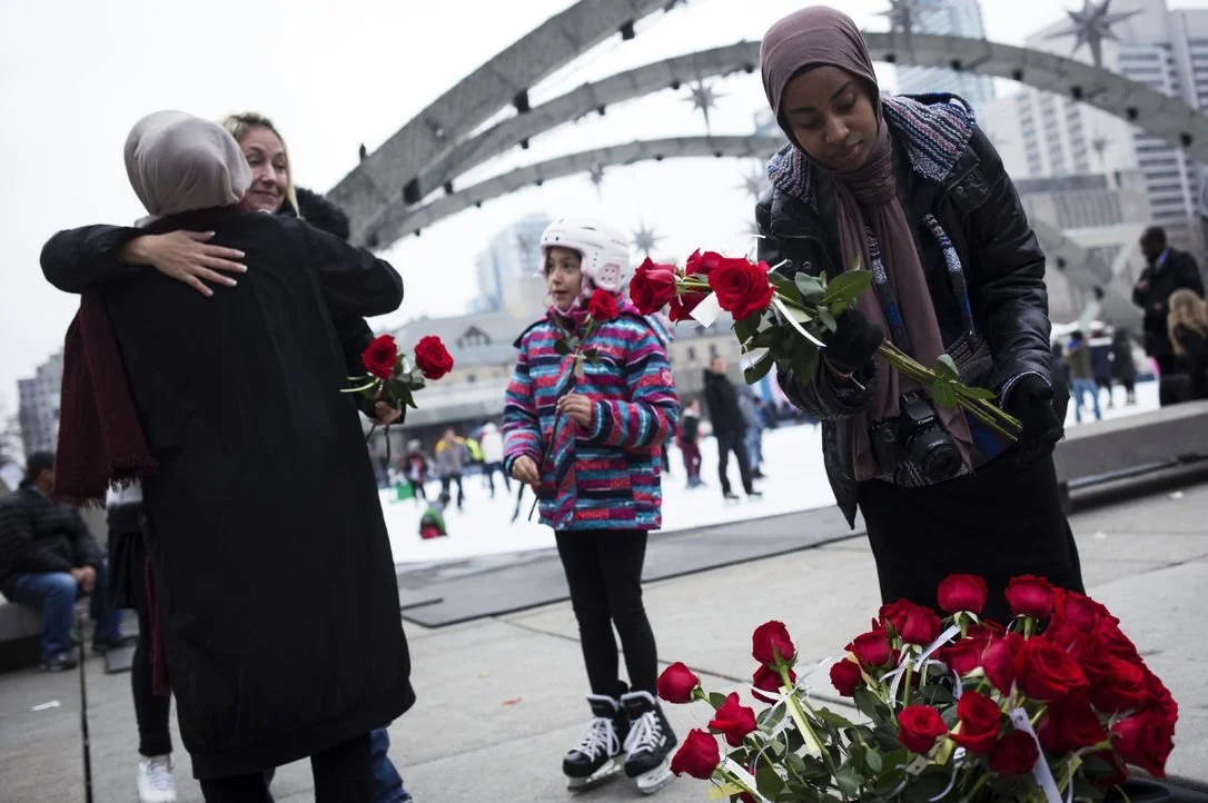 Muslim Women Hand Out Roses as a Thank-You for Toronto’s Support