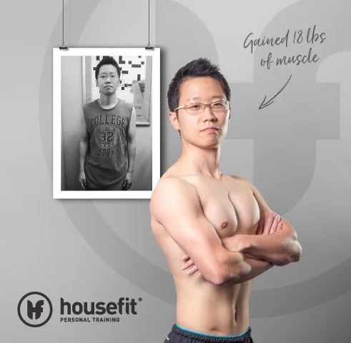 A shirtless man with glasses and crossed arms standing in front of a fitness poster. The poster shows a previous photo of him in a gray T-shirt, with text indicating he gained 18 pounds of muscle.