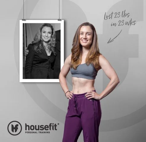 A woman standing in workout clothes with her hands on her hips, smiling, with a black and white photo of her in a blazer on the wall behind her. A handwritten note indicates she lost 23 pounds in 23 weeks. The Housefit Personal Training logo is at the bottom.