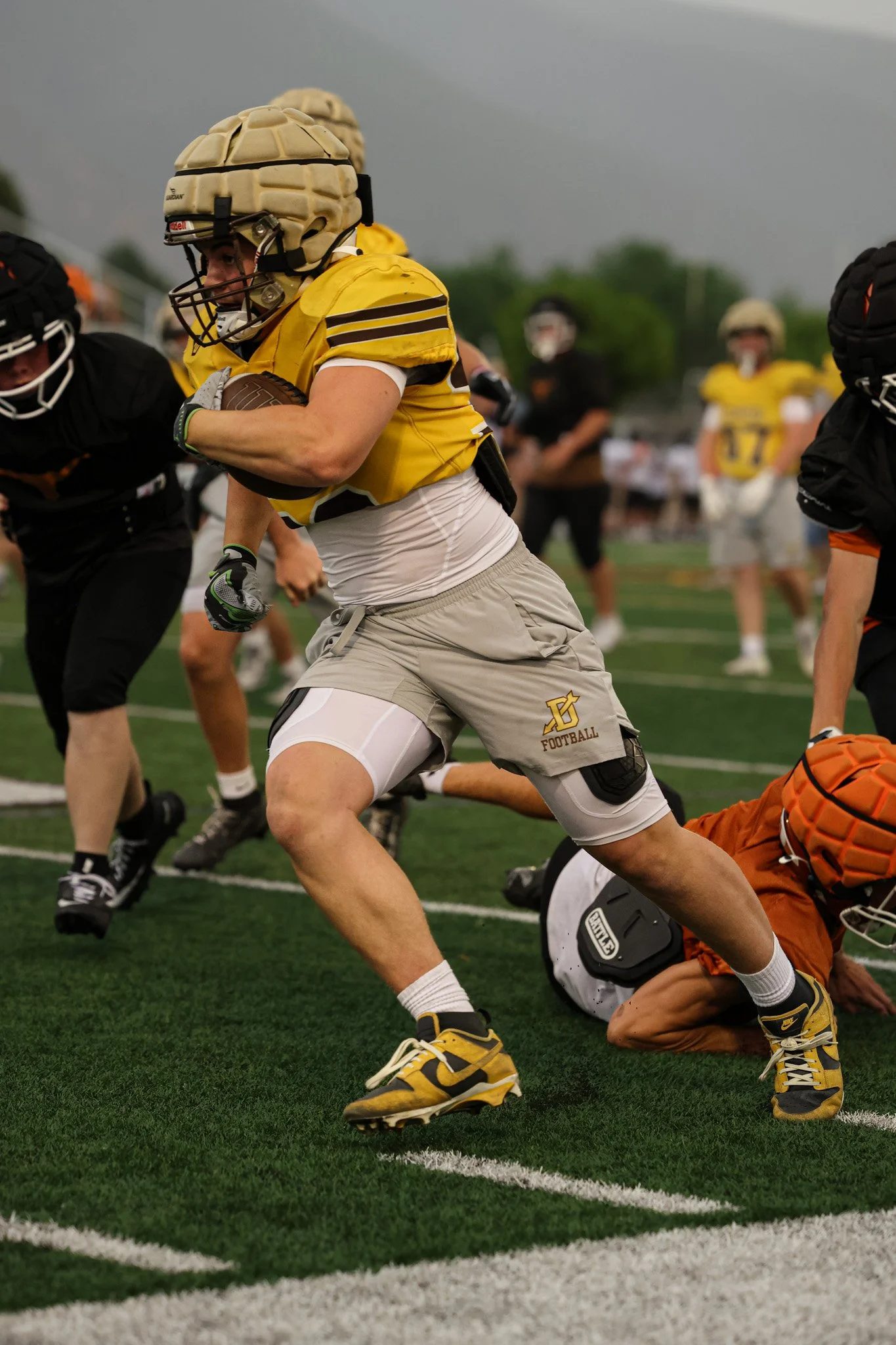 Summer high school football scrimmage.