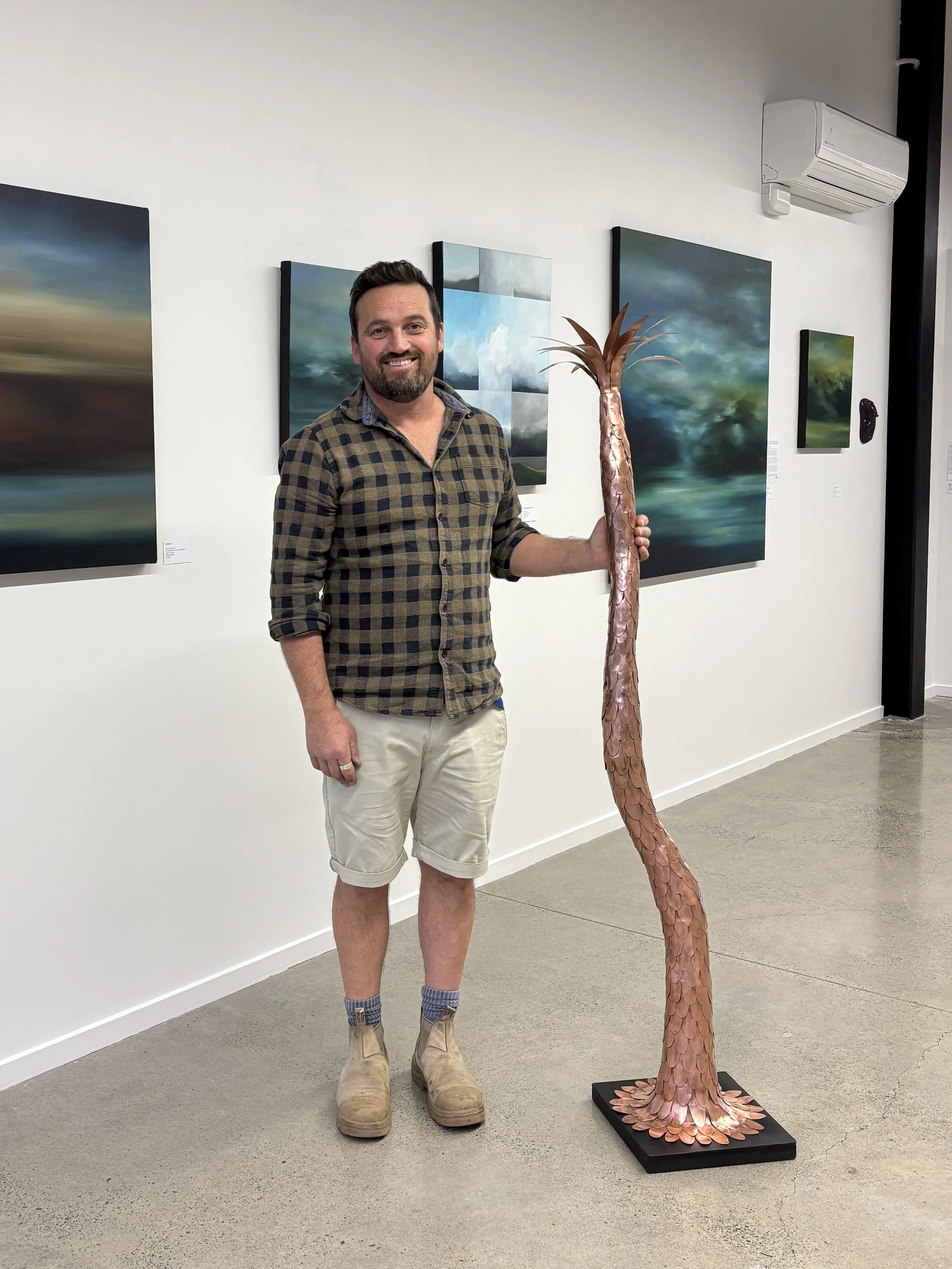 michael-phillip-bennett-with-copper-sculpture