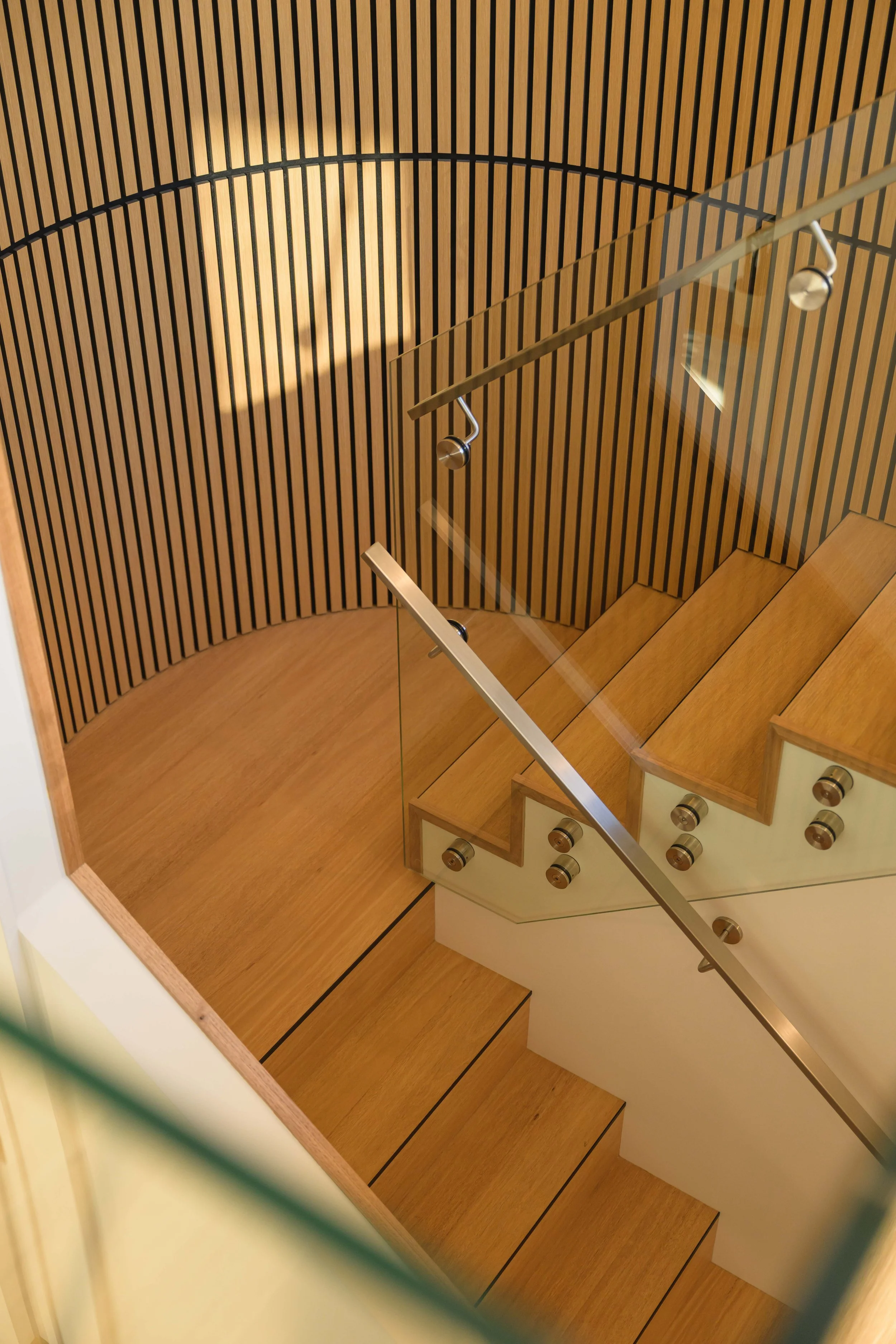 Curved staircase detail | Ashe Interior Design Christchurch