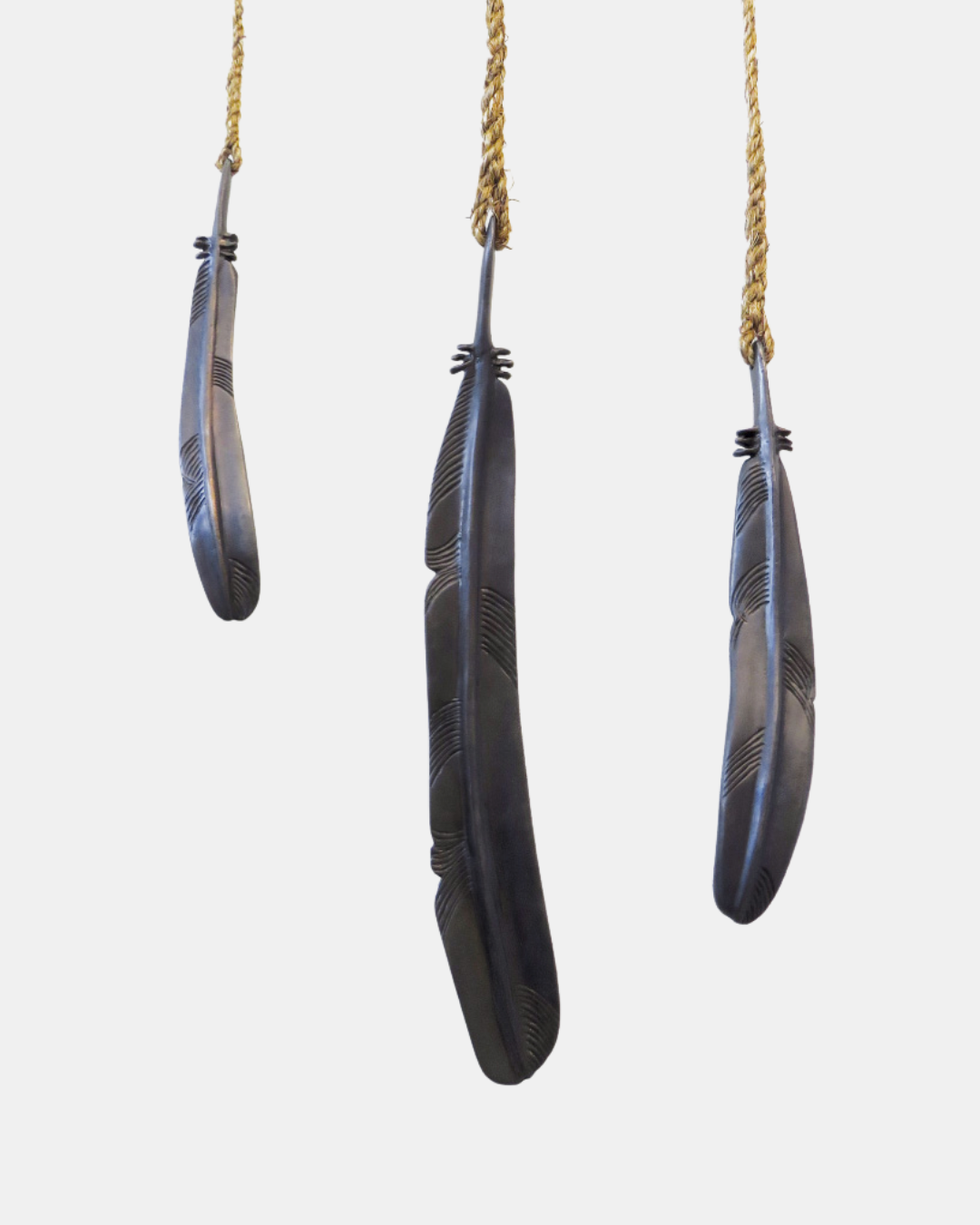 Jay Lloyd Koa Bronze Hanging Sculptures (3).png