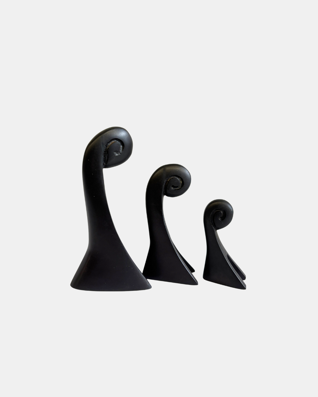 Cast Bronze Koru Sculptures.png