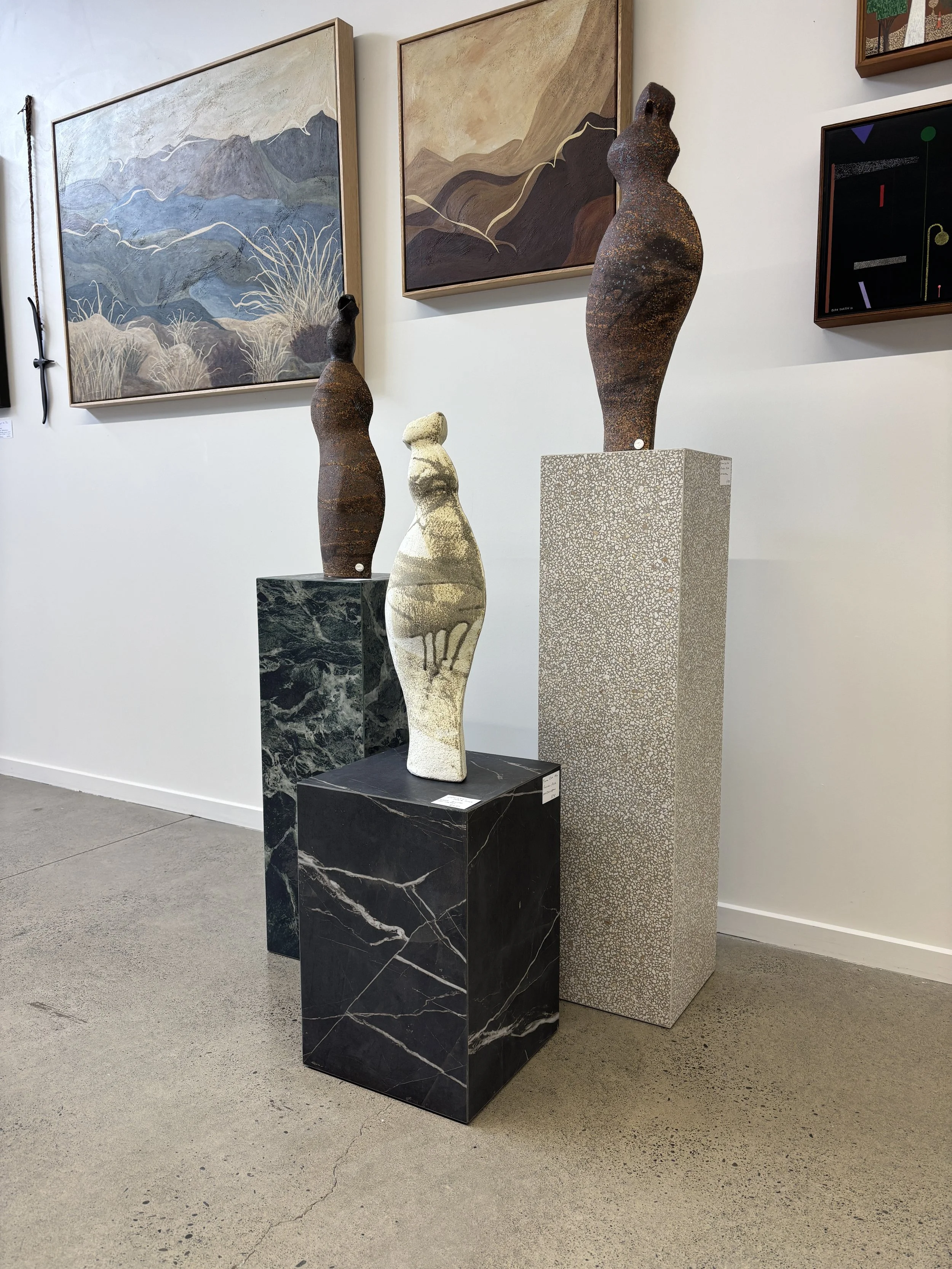 Collection of Porcelain Plinths in the gallery with sculptures on display (Copy) (Copy)