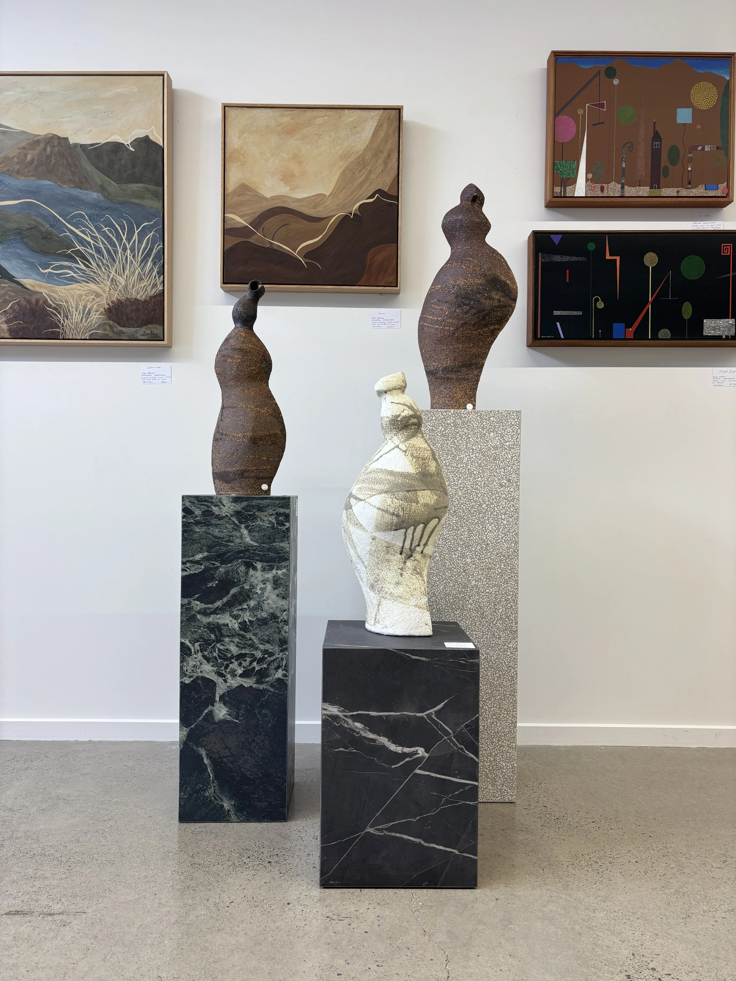 Collection of Porcelain Plinths in the gallery with sculptures on display (Copy) (Copy)