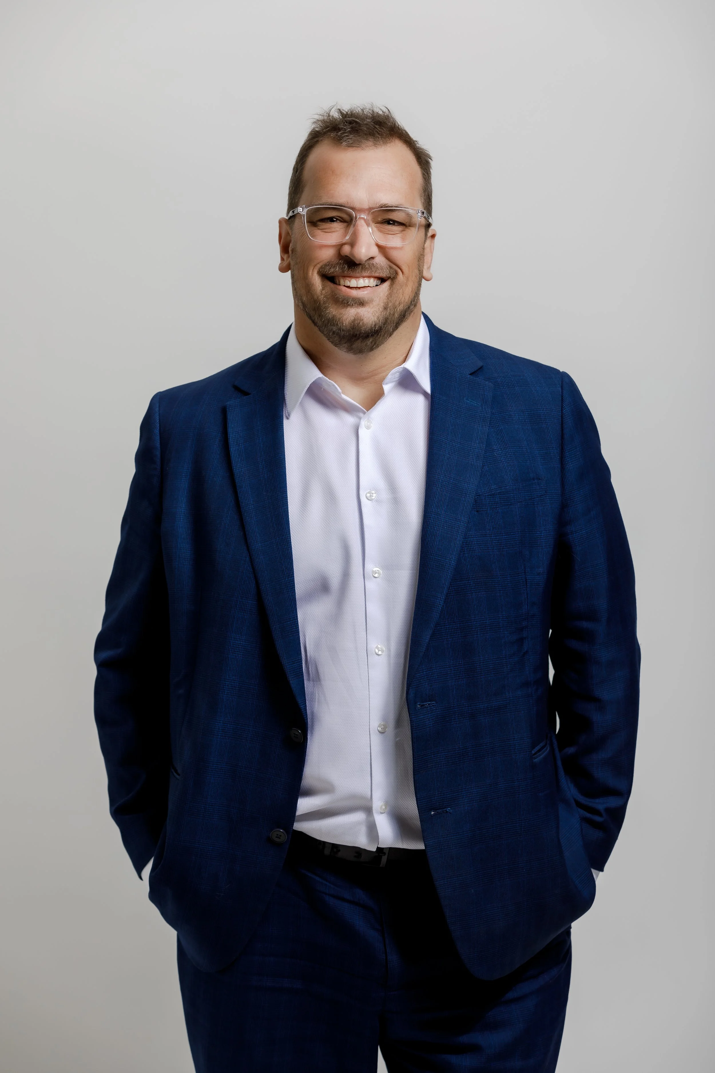 studio-headshot-male-white-backdrop-realestate-agent