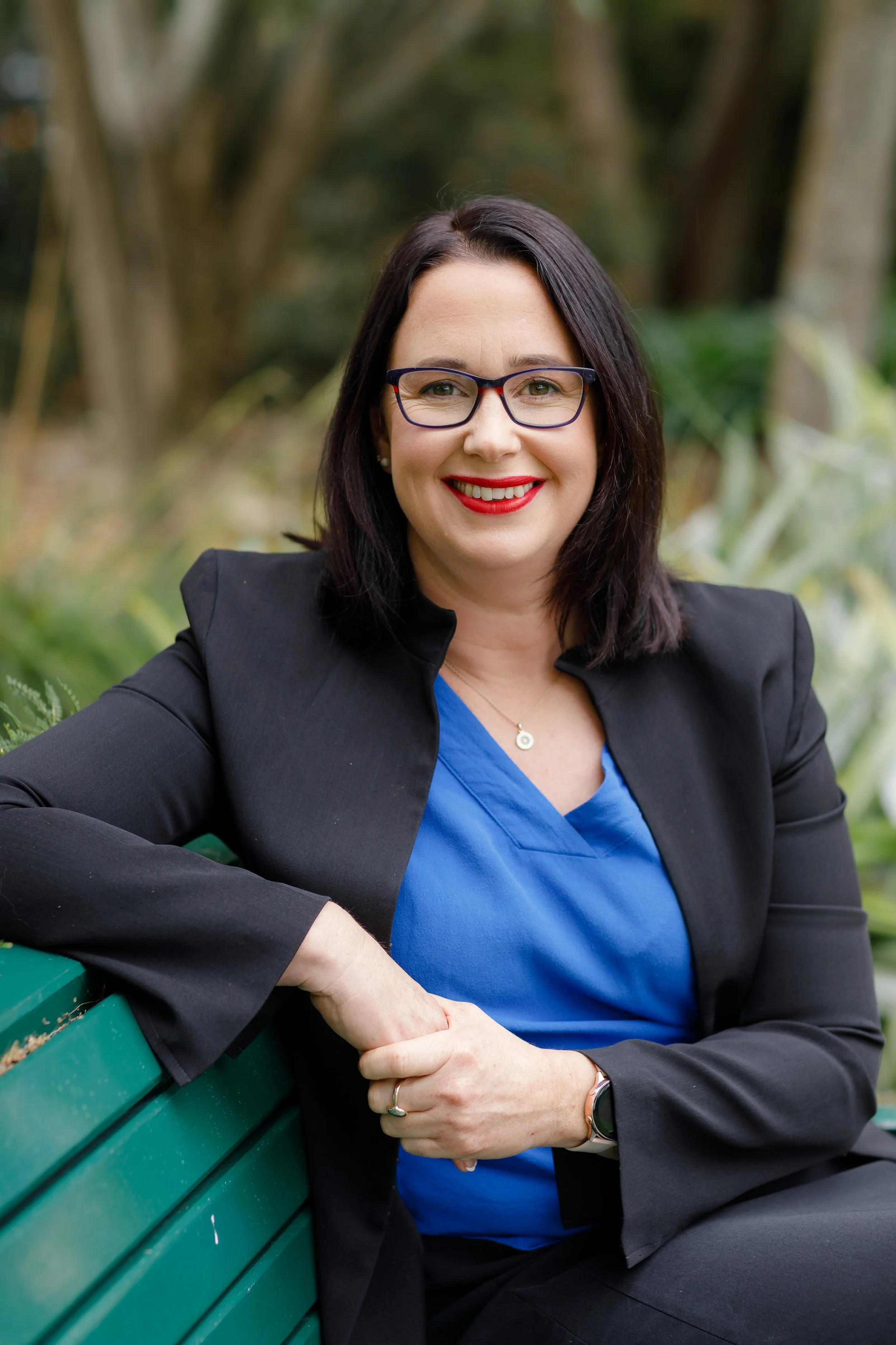 natural-light-headshot-female-real-estate-agent-sitting-down