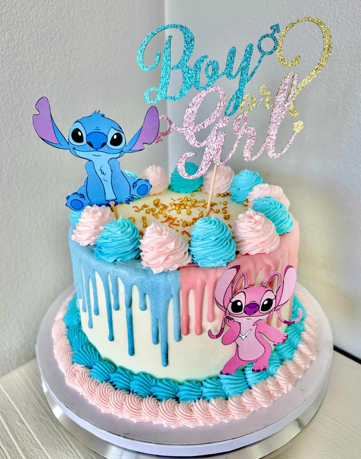 Gender reveal cake! 💙🩷

#liloandstitch #genderreveal #stitchandangel #babyshower #customcake #bayarea #bayareabakery
